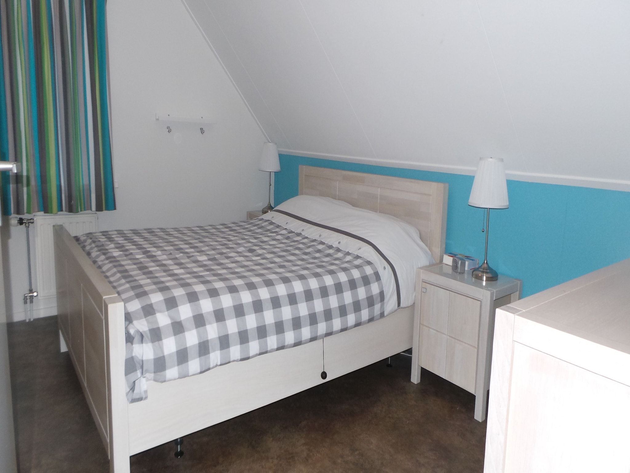 Een slaapkamer van Buitenplaats Berg en Bos nummer 15 in Lemele