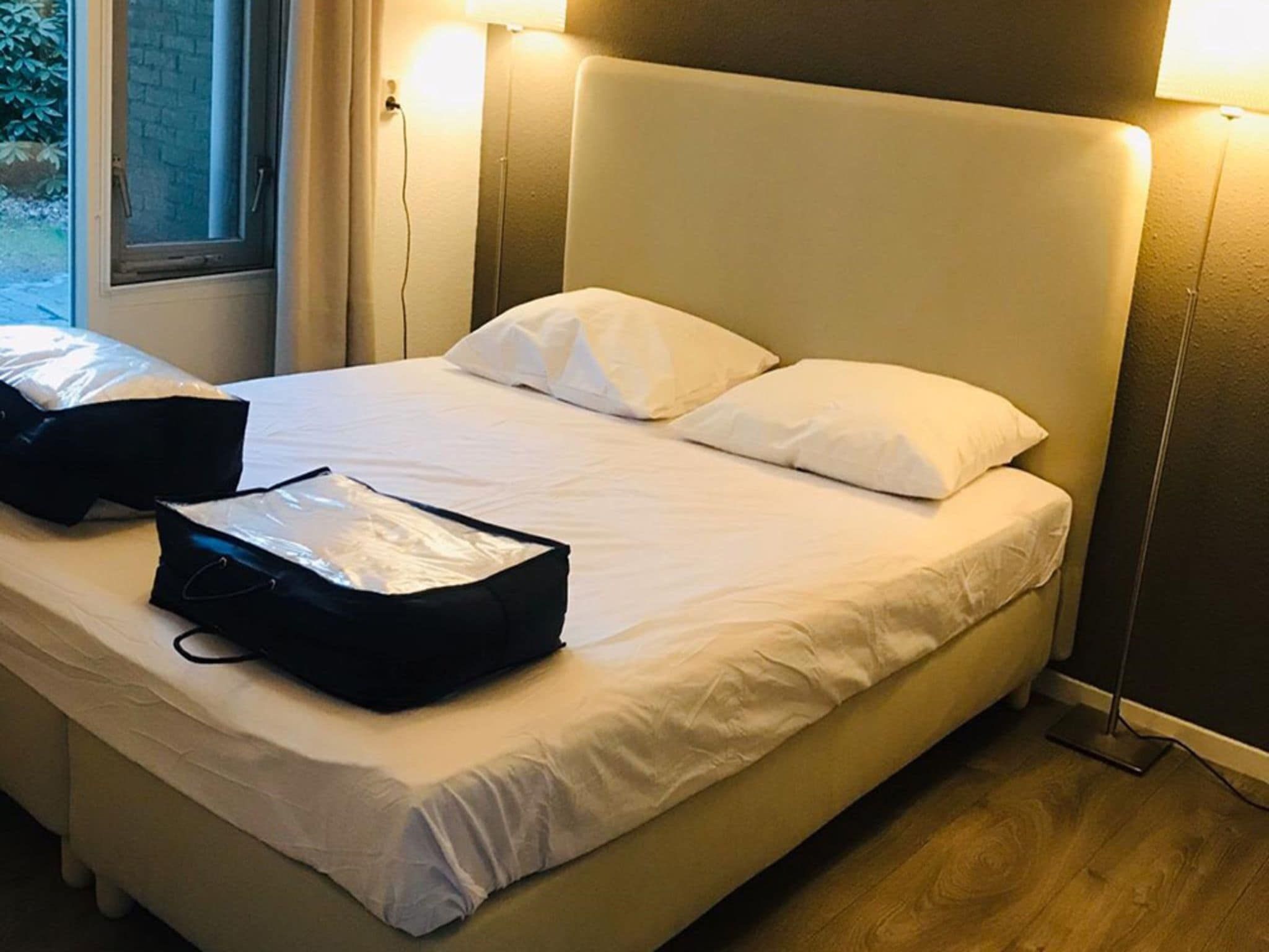 Een slaapkamer van Buitenplaats Berg en Bos nummer 4 in Lemele