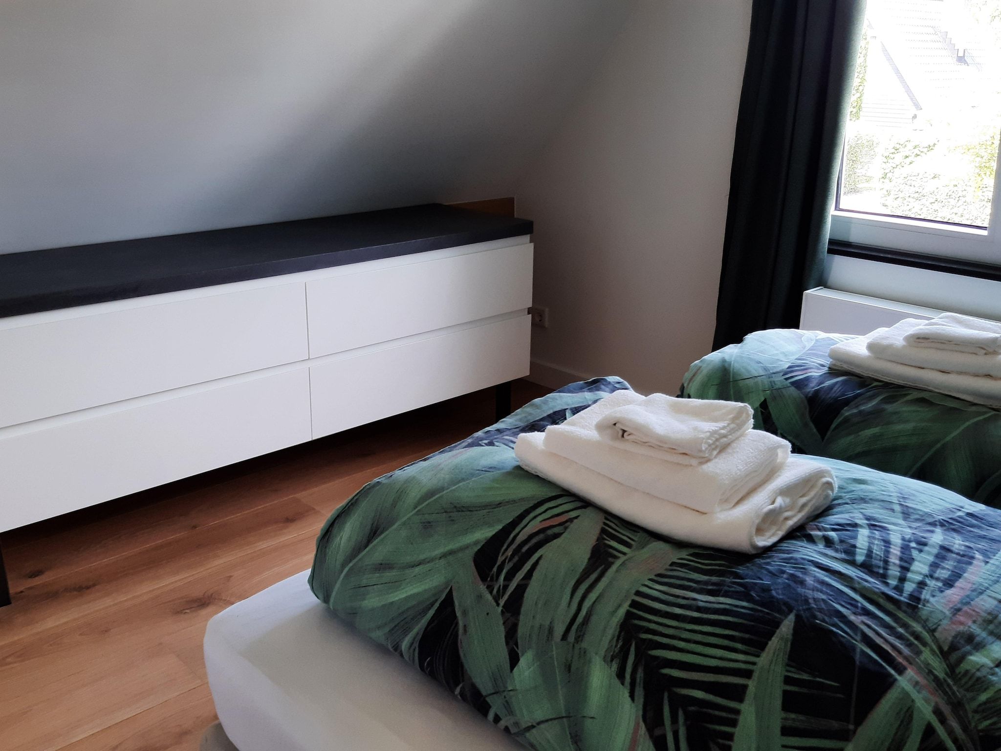 Een slaapkamer van Vakantiehuis DJEZ in Tuitjenhorn