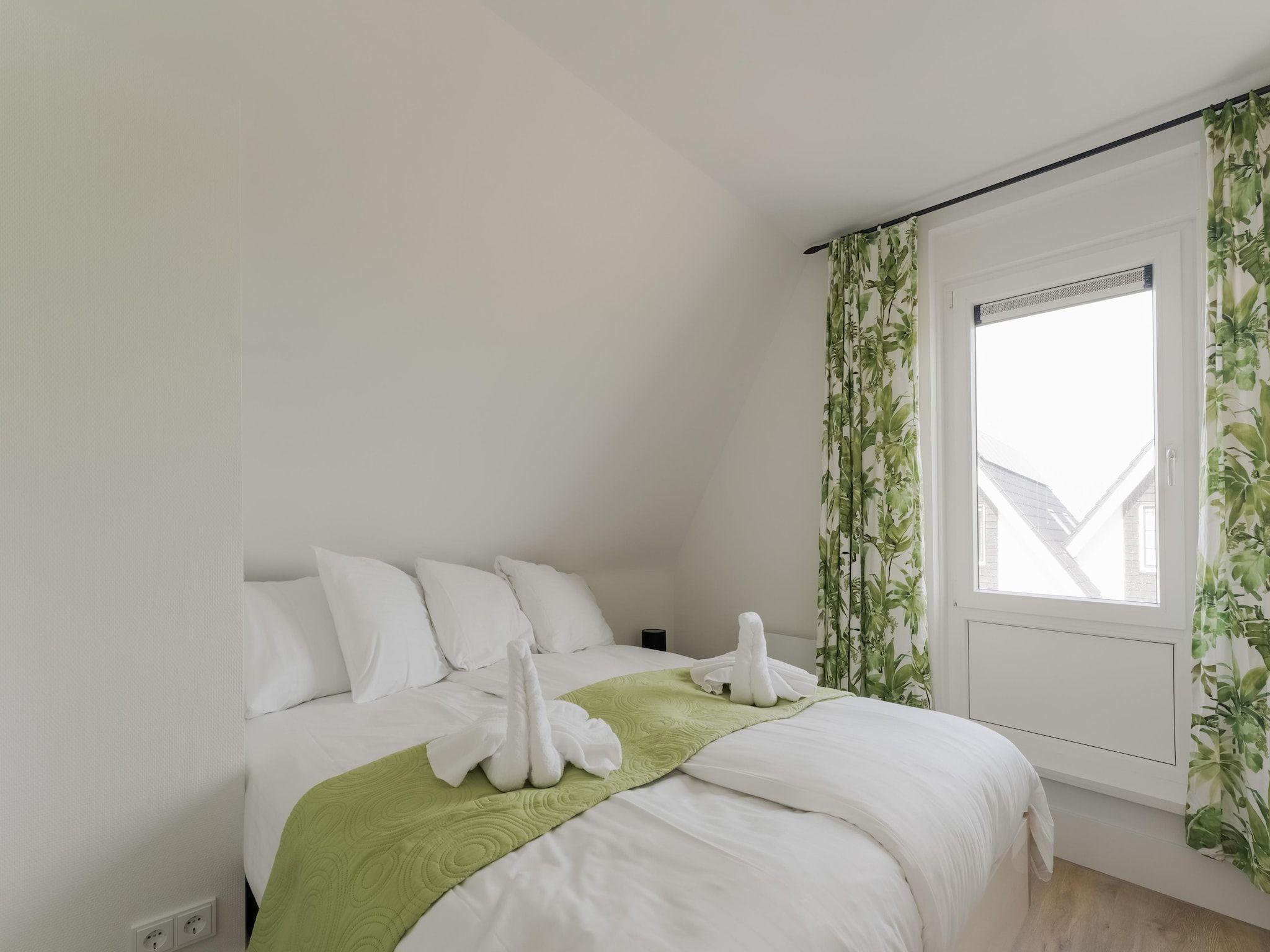 Een slaapkamer van Luxe villa aan het water in Stavoren