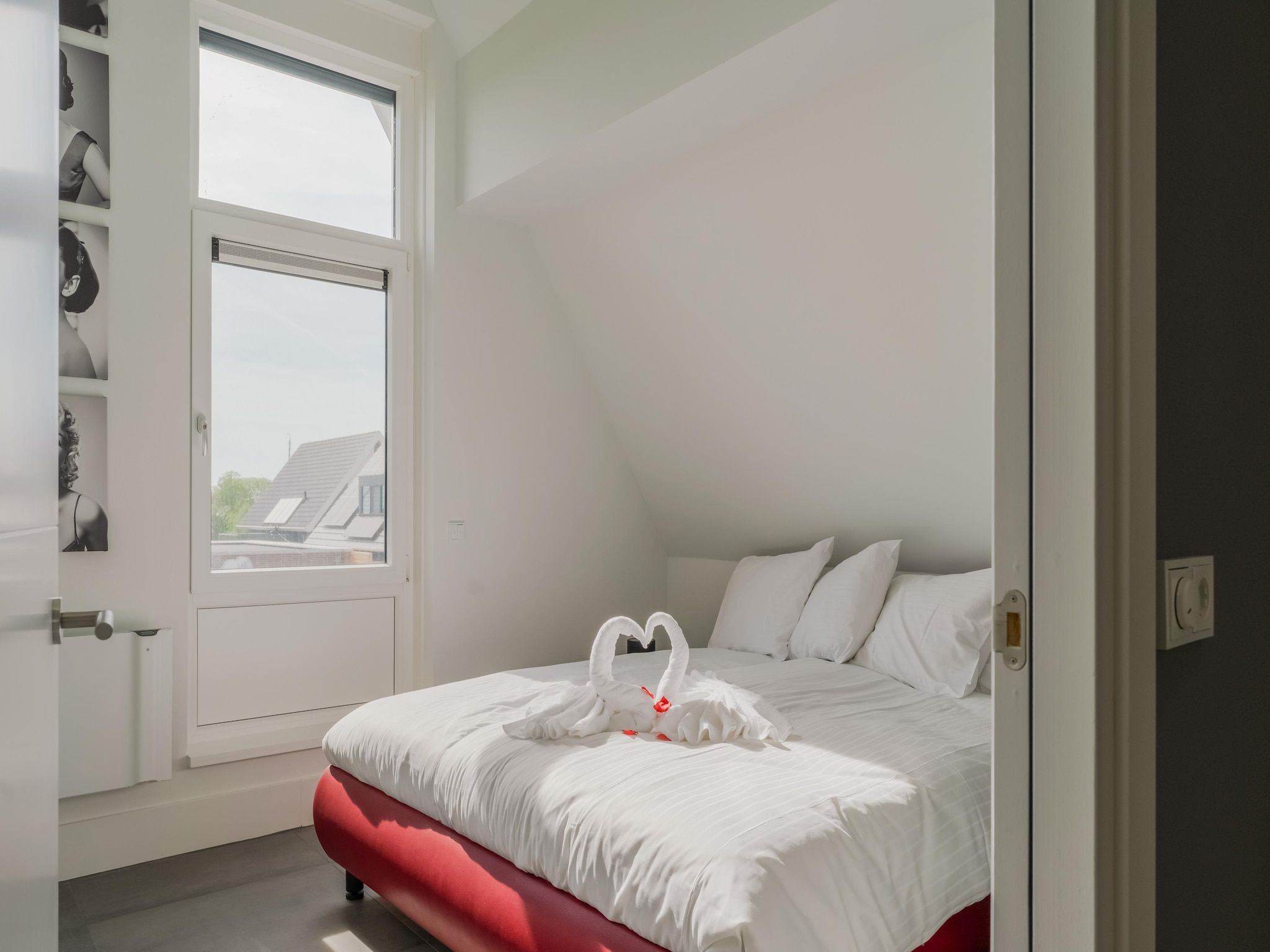 Een slaapkamer van Luxe villa aan het water in Stavoren