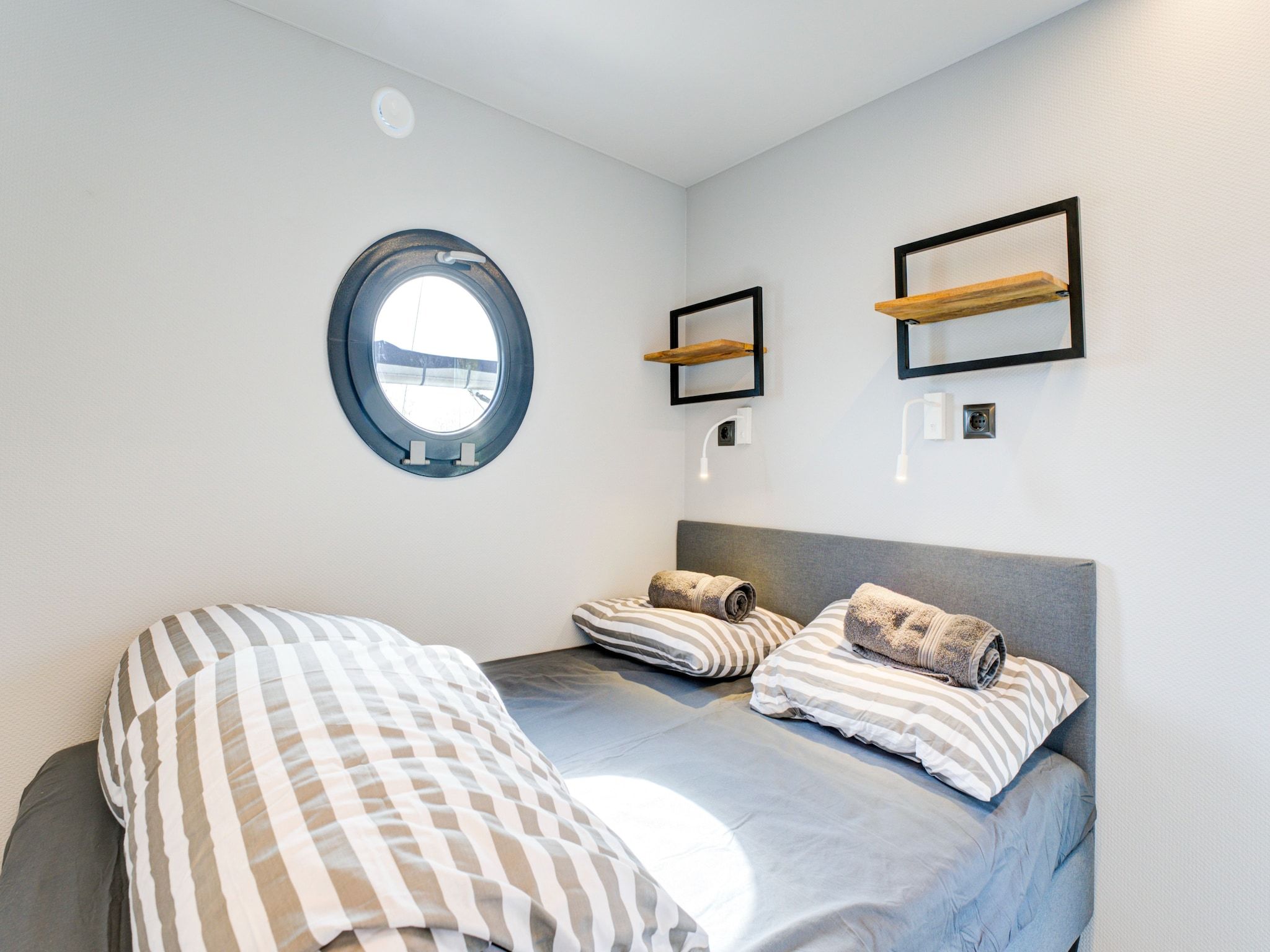 Een slaapkamer van La Belle Vie in Volendam