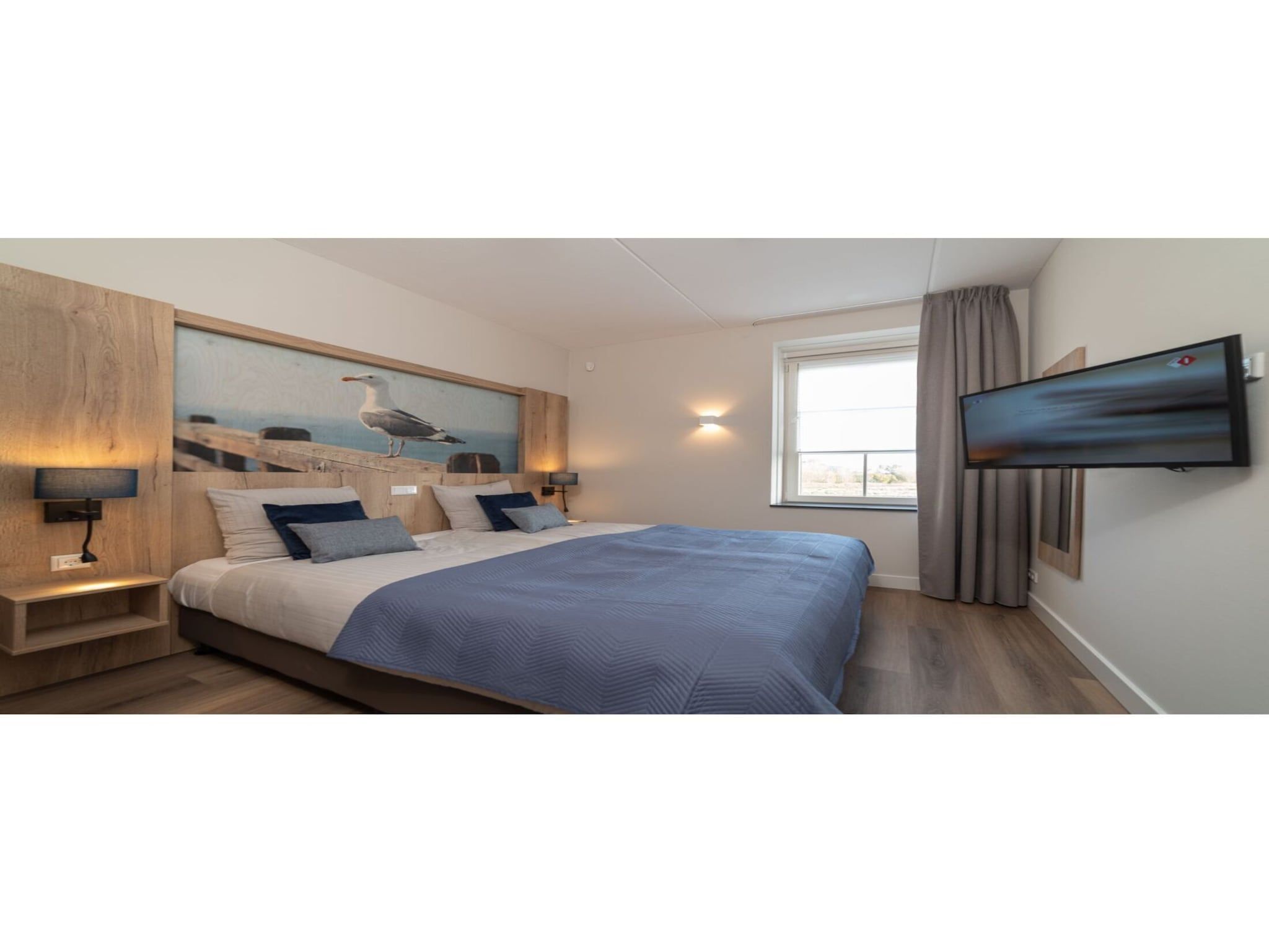 Een slaapkamer van Zeeuwse Parel Appartement 4 pers 1 bdk - 1 in Colijnsplaat