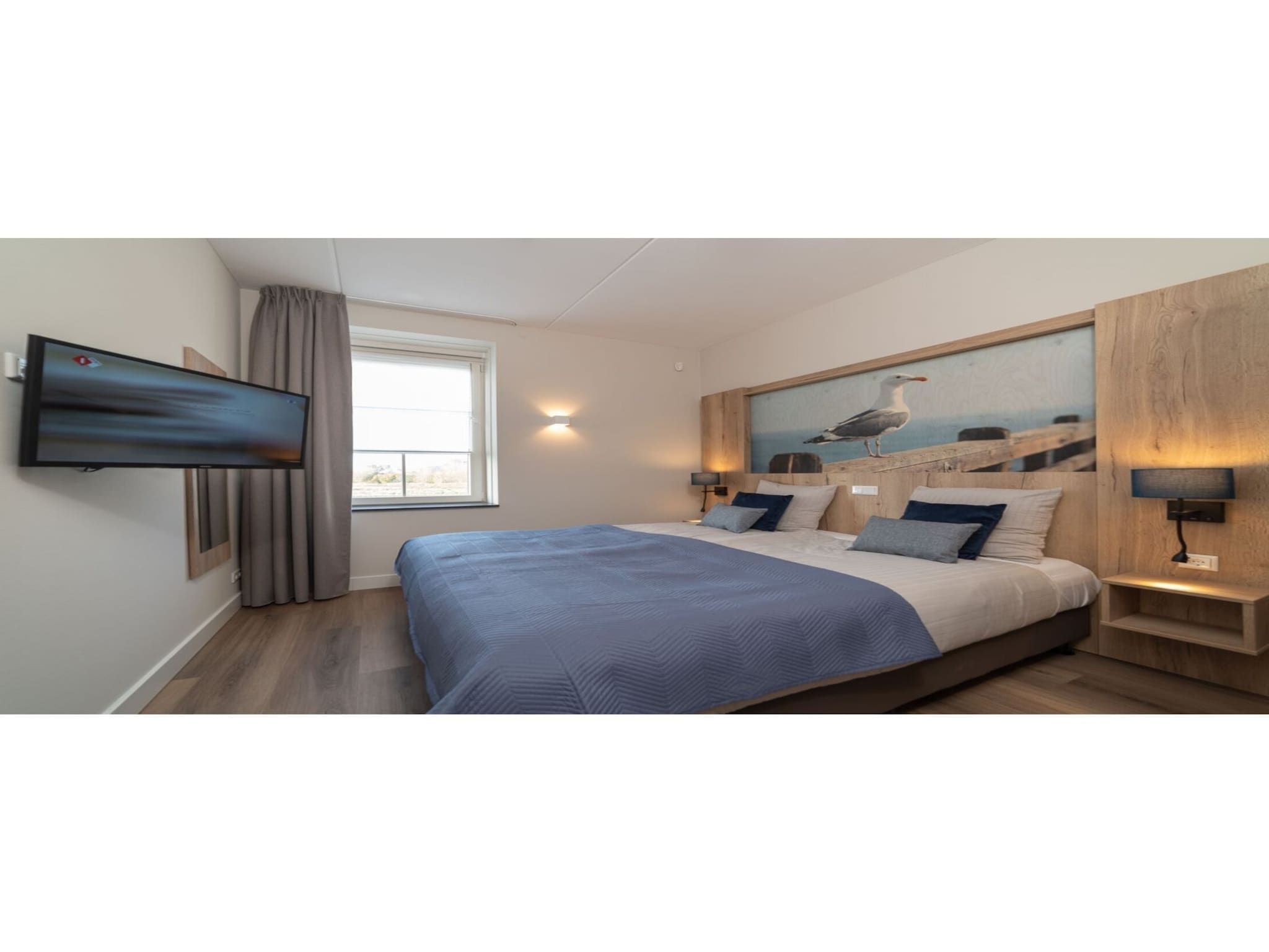 Een slaapkamer van Zeeuwse Parel Appartement 4 pers 1 bdk - 1 in Colijnsplaat