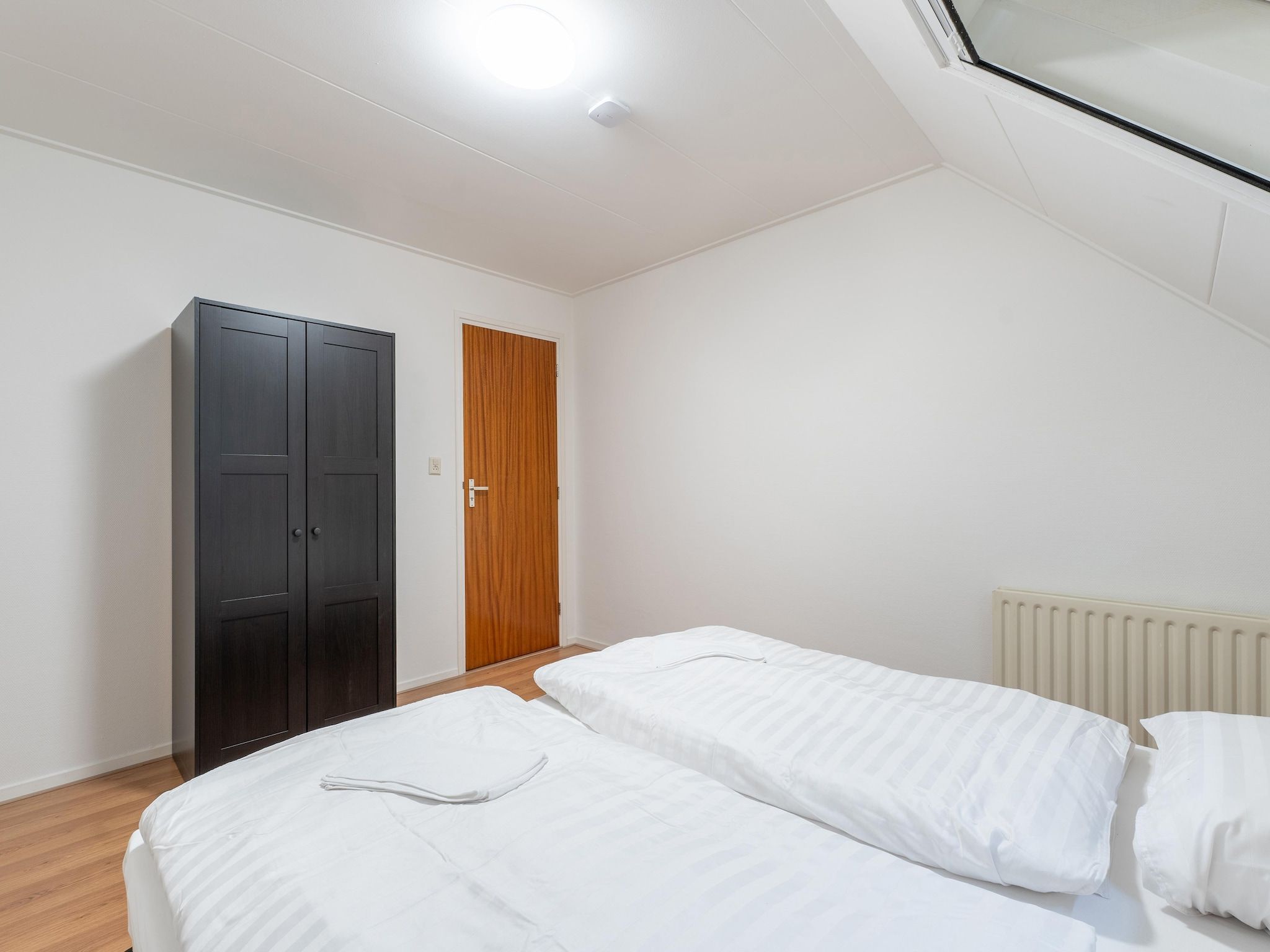 Een slaapkamer van Genieten in Silvolde II in Silvolde