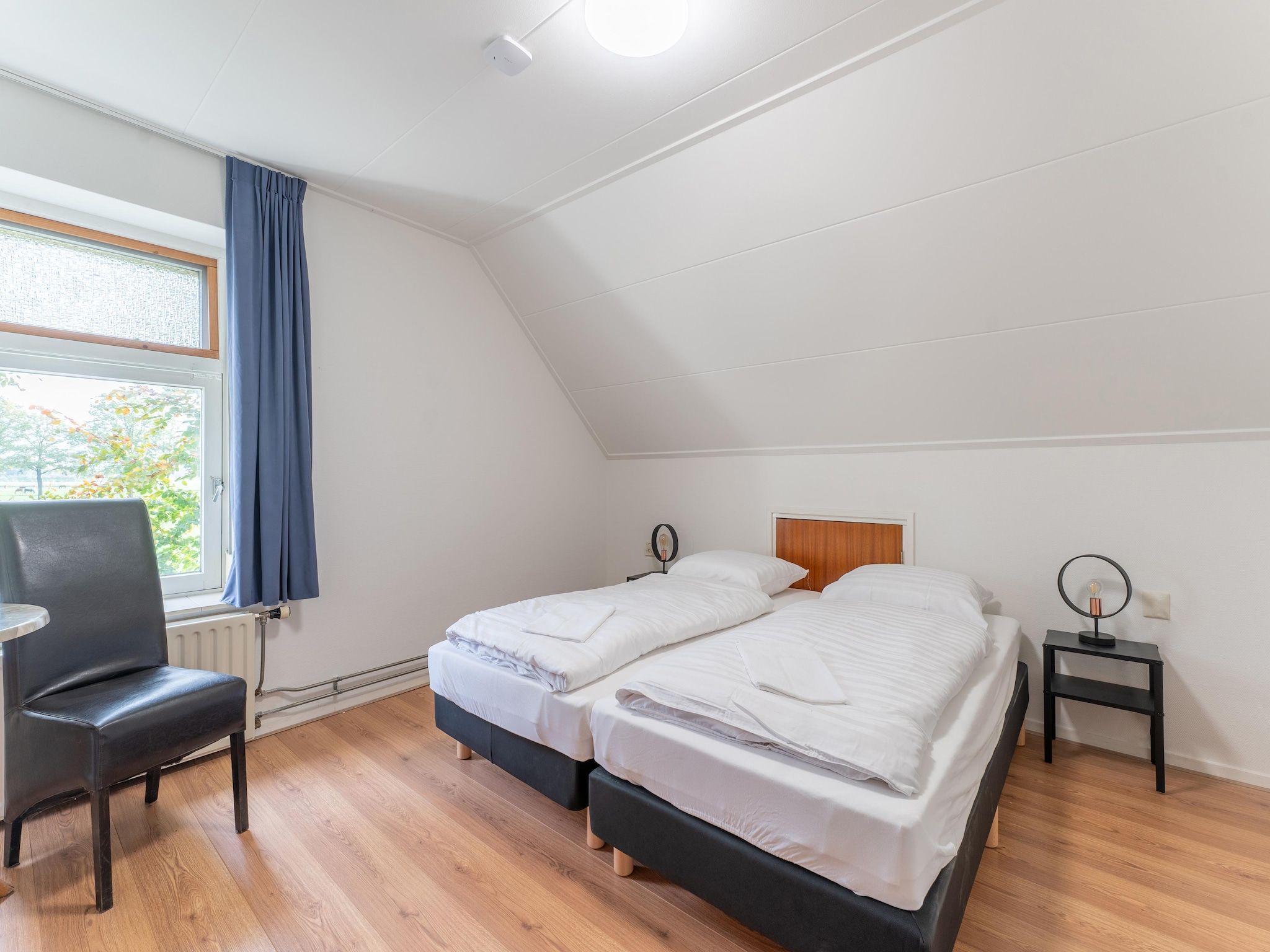 Een slaapkamer van Genieten in Silvolde II in Silvolde