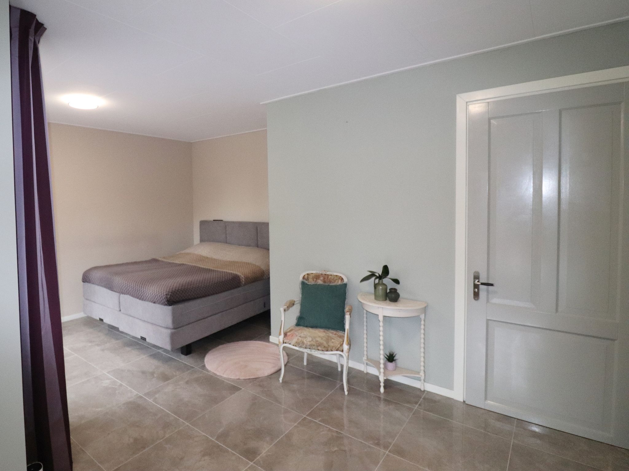 Een slaapkamer van Appartement Notenbomer in Kornhorn