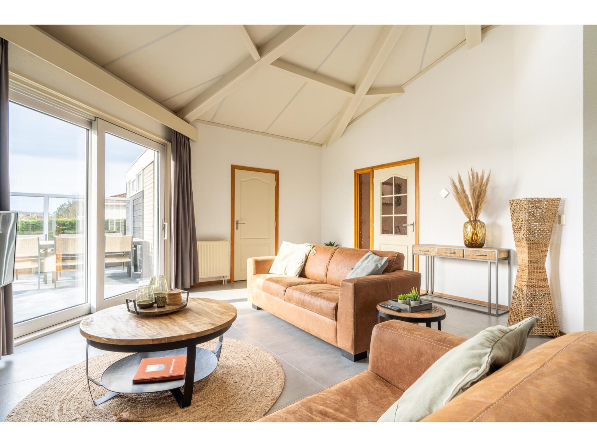 De woonkamer van Golfvilla 39 Wellness in Hollum