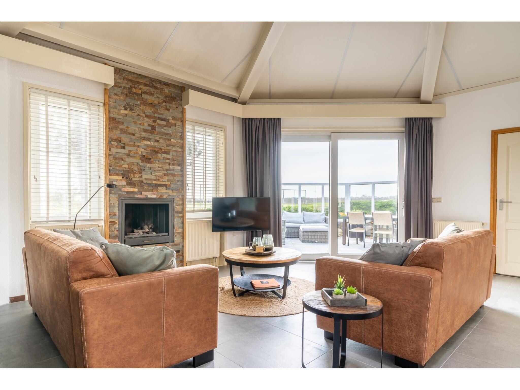 De woonkamer van Golfvilla 39 Wellness in Hollum