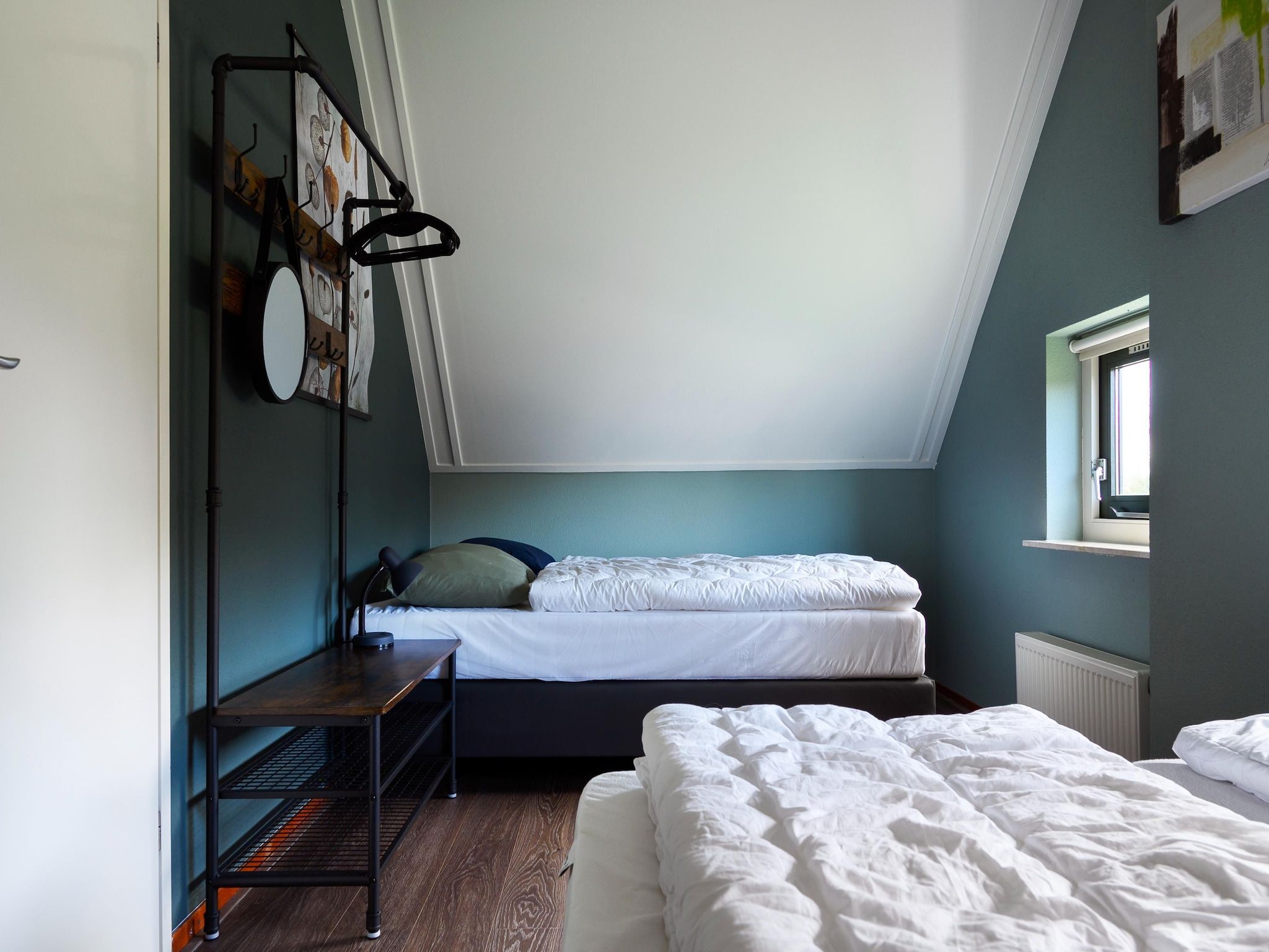 Een slaapkamer van 10 pers Lieskehuis Wellness de luxe met sauna buitenspa in Groningen