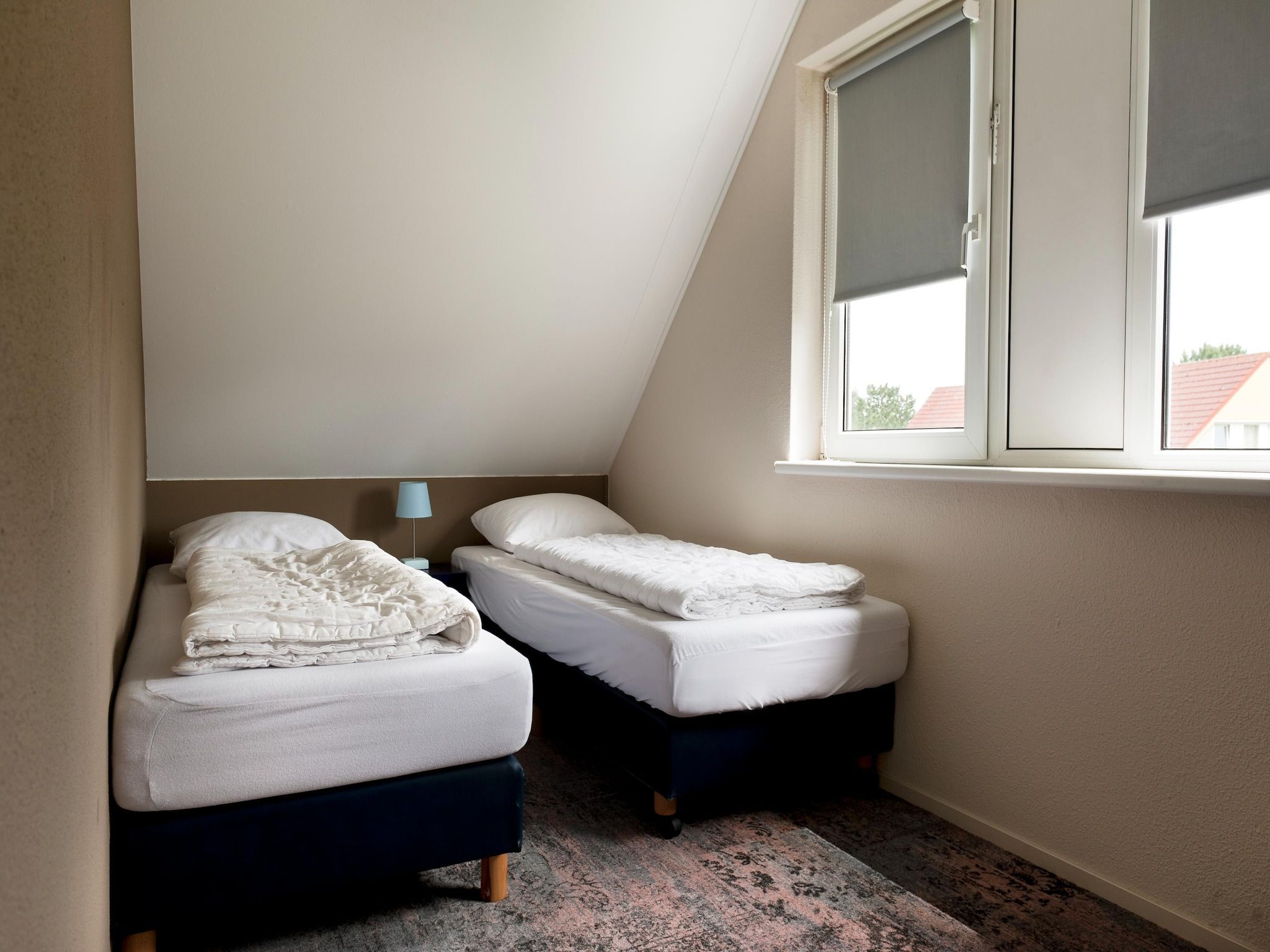 Een slaapkamer van 6 pers Renneborghuis Wellness Comfort met sauna in Groningen