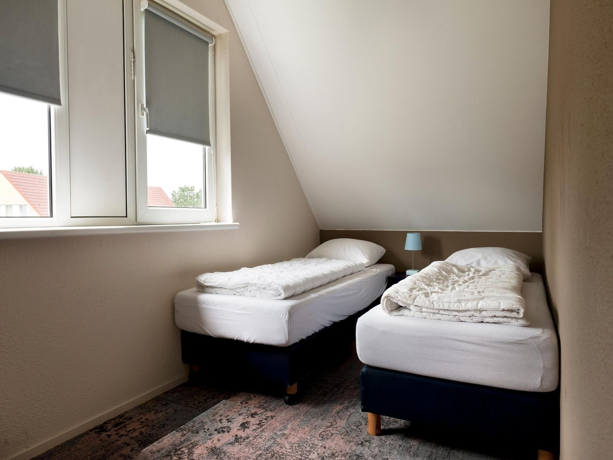 Een slaapkamer van 6 pers Renneborghuis Wellness Comfort met sauna in Groningen