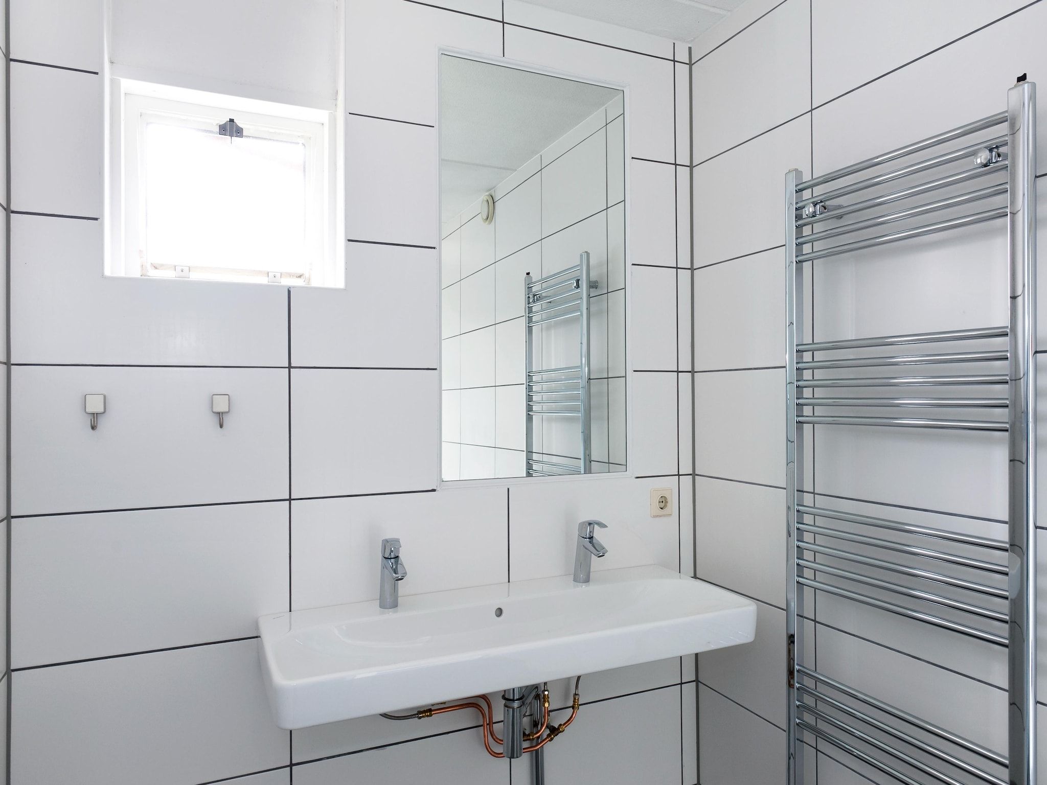 De badkamer van Grand Fisker Wellness de luxe met sauna buitenspa & sloep seizoensgebonden in Friesland