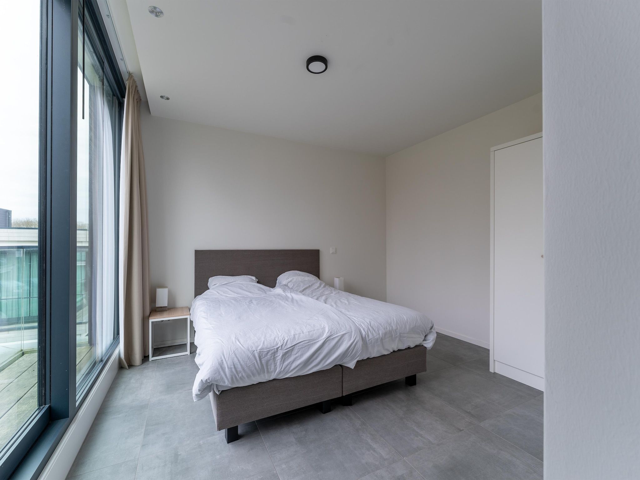 Een slaapkamer van Harbour Village 15 in Arnemuiden