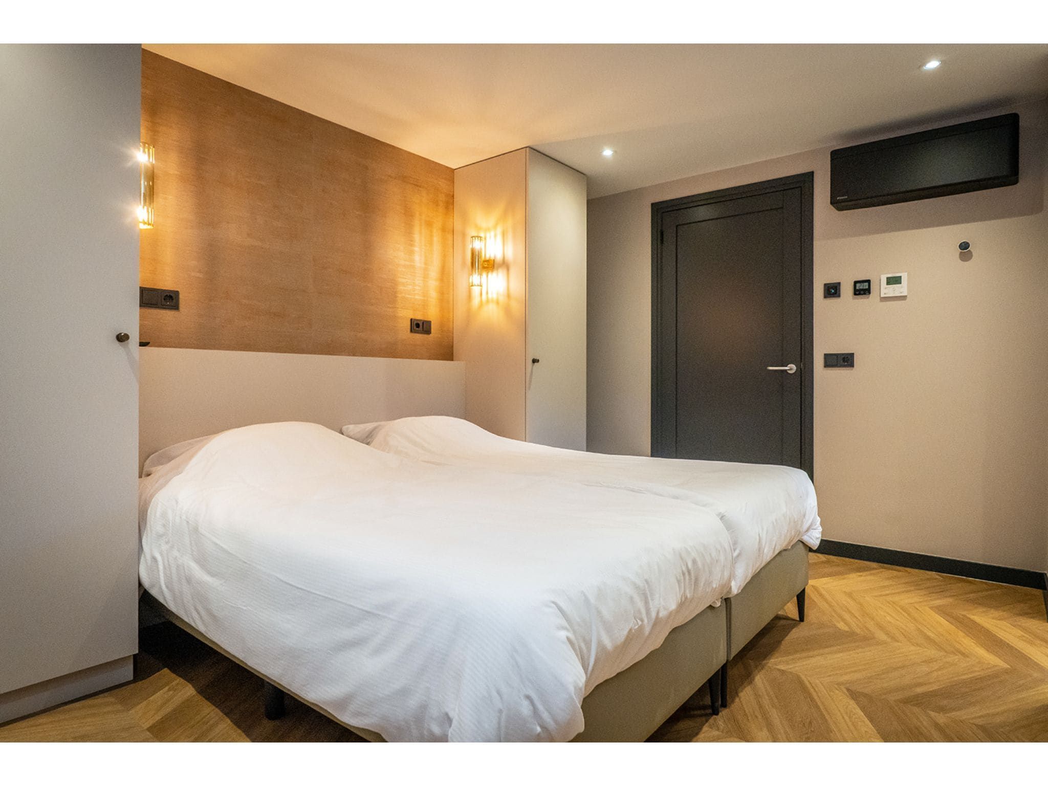 Een slaapkamer van Type N Luxe Villa Zeeburg in De Cocksdorp