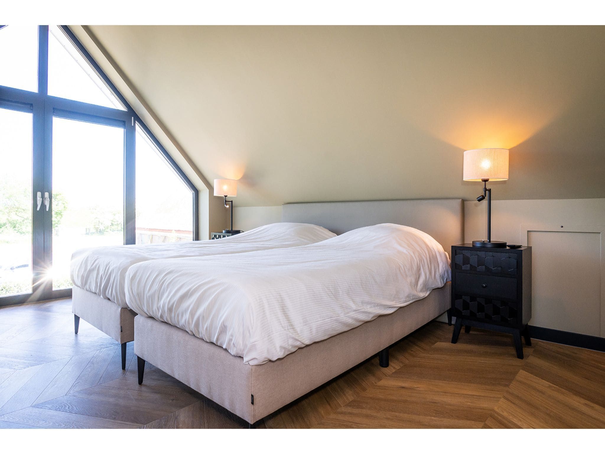 Een slaapkamer van Type N Luxe Villa Zeeburg in De Cocksdorp