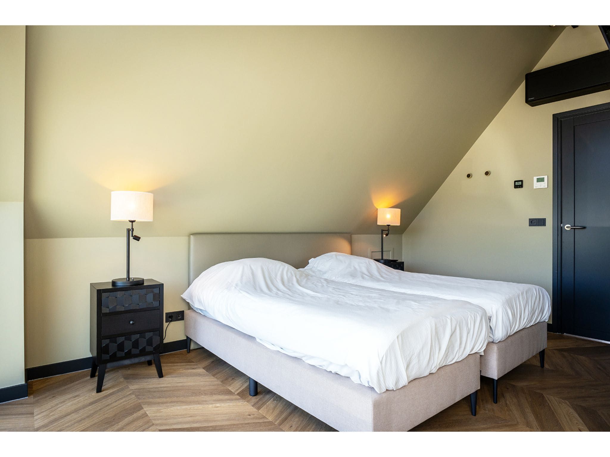 Een slaapkamer van Type N Luxe Villa Zeeburg in De Cocksdorp