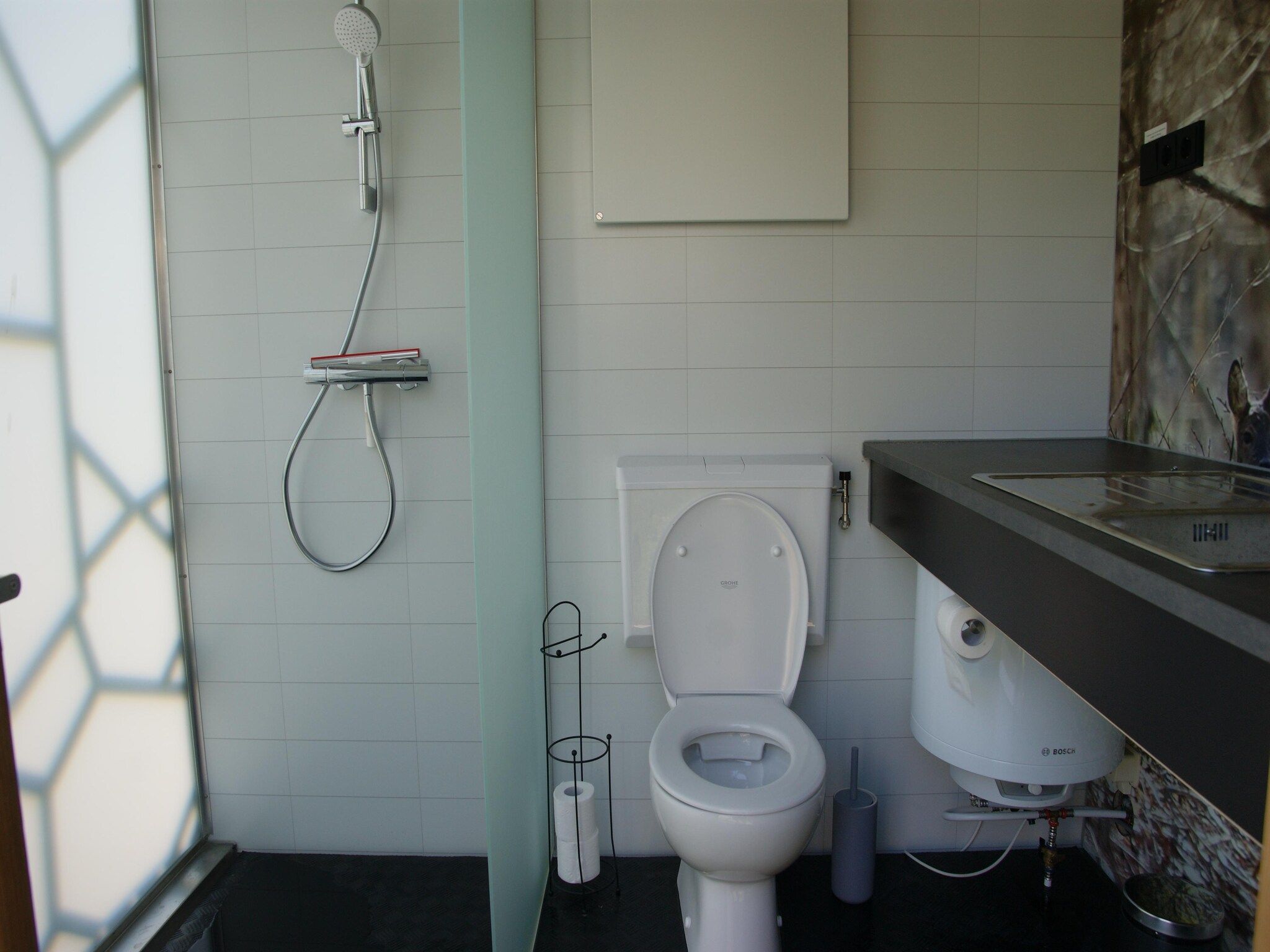 De badkamer van Tentlodge Partijs Wellness met sauna en prive-bad-2p in Dalerveen