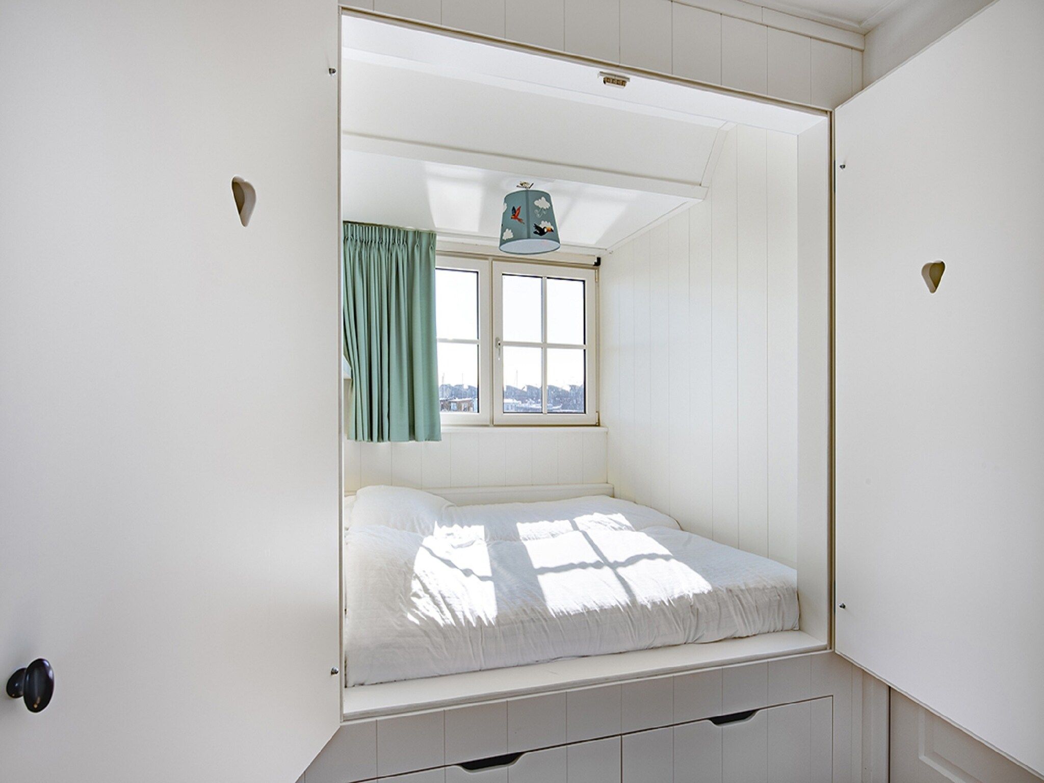 Een slaapkamer van Friese Meren Villa's 22 in Delfstrahuizen