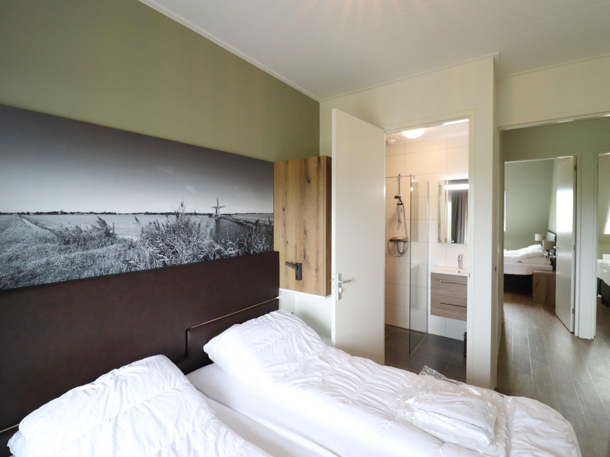 Een slaapkamer van Friese Villa in Leons in Leons