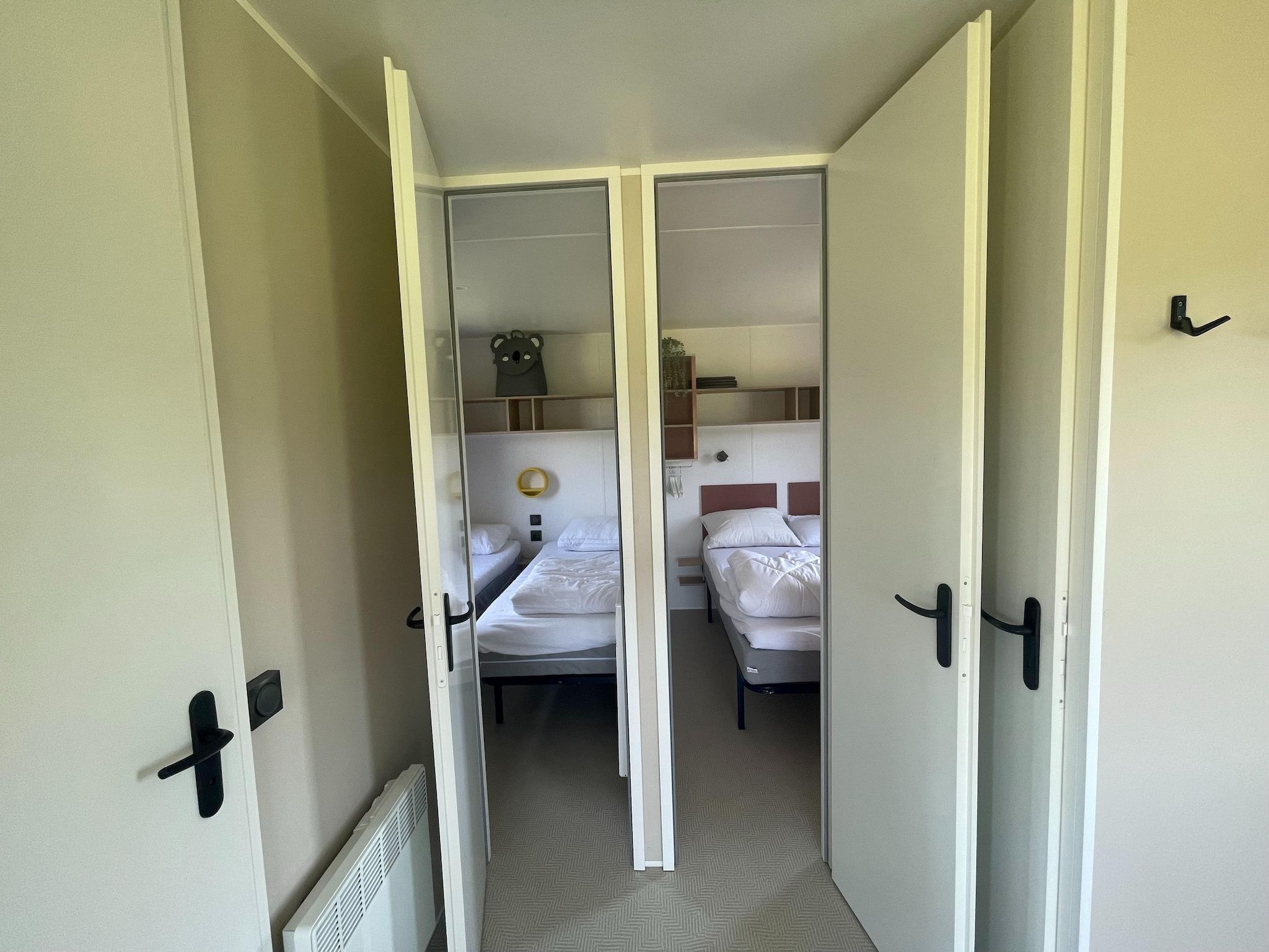 Een slaapkamer van Elperhof Veldlodge in Schoonloo
