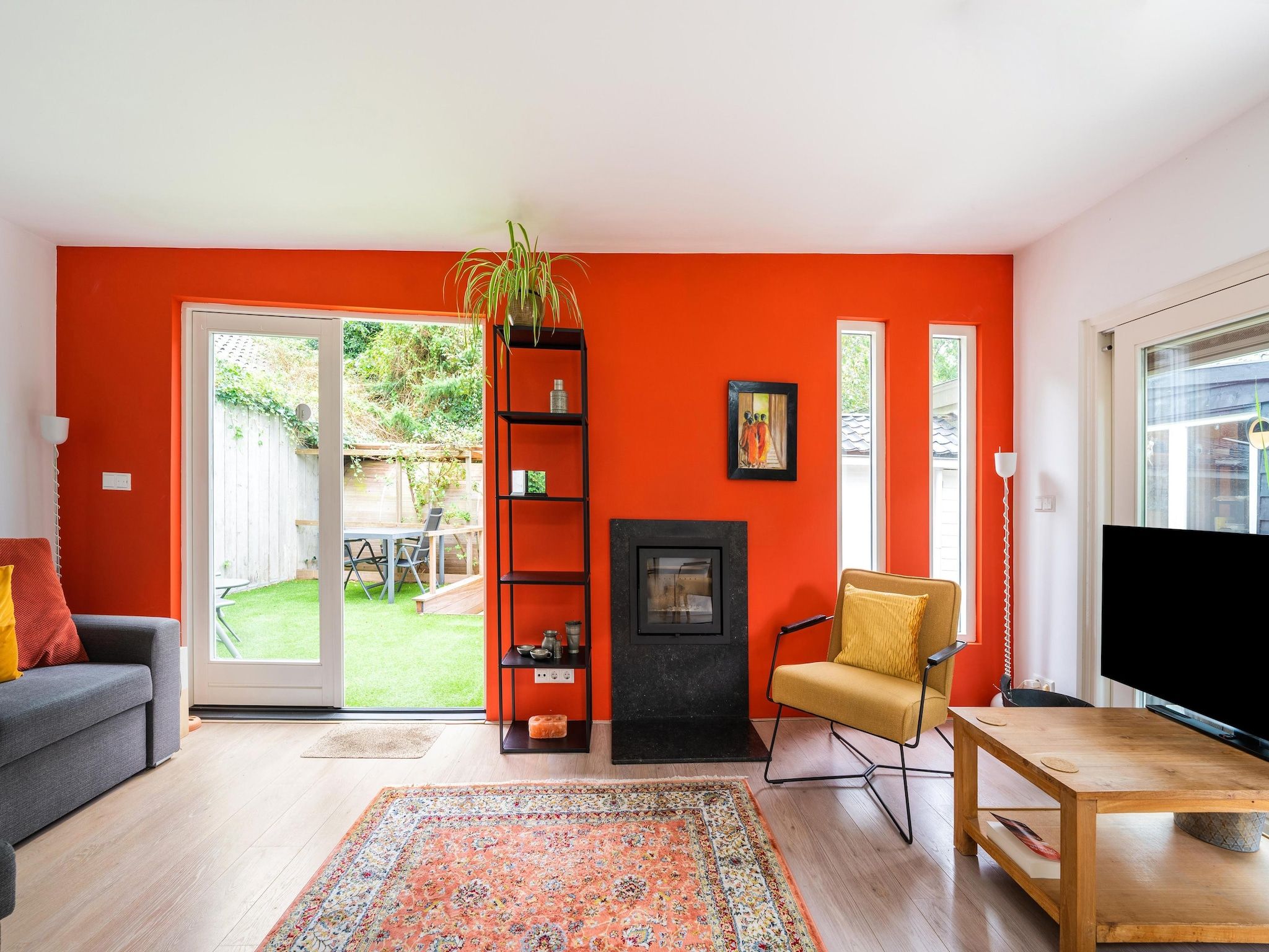 De woonkamer van De Klimroos in Bergen