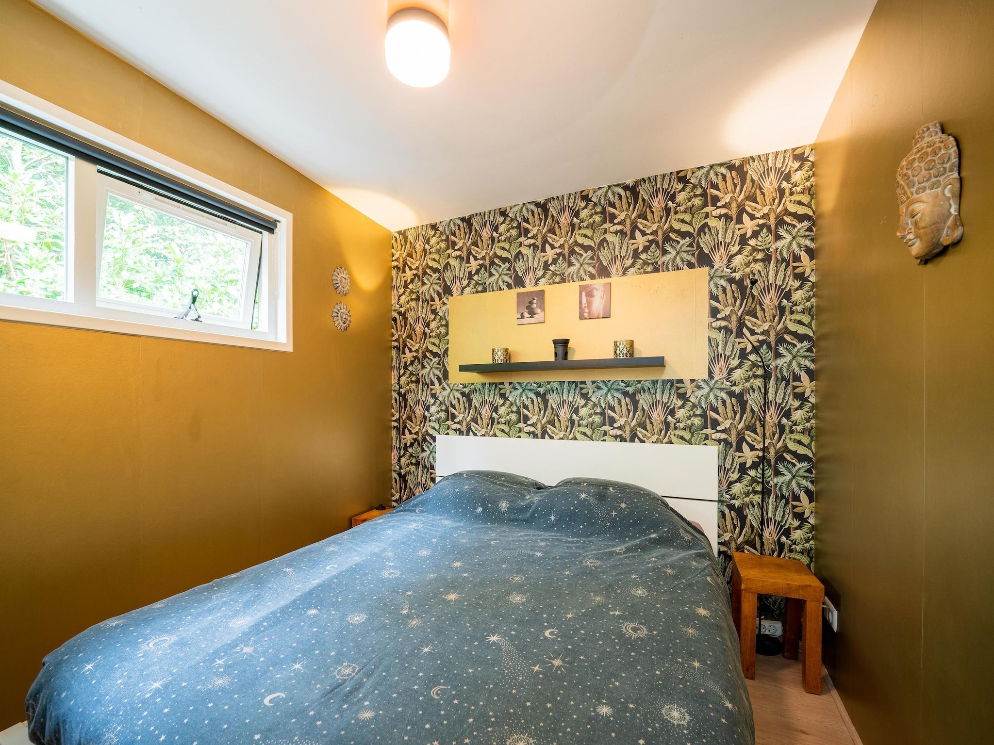Een slaapkamer van De Klimroos in Bergen