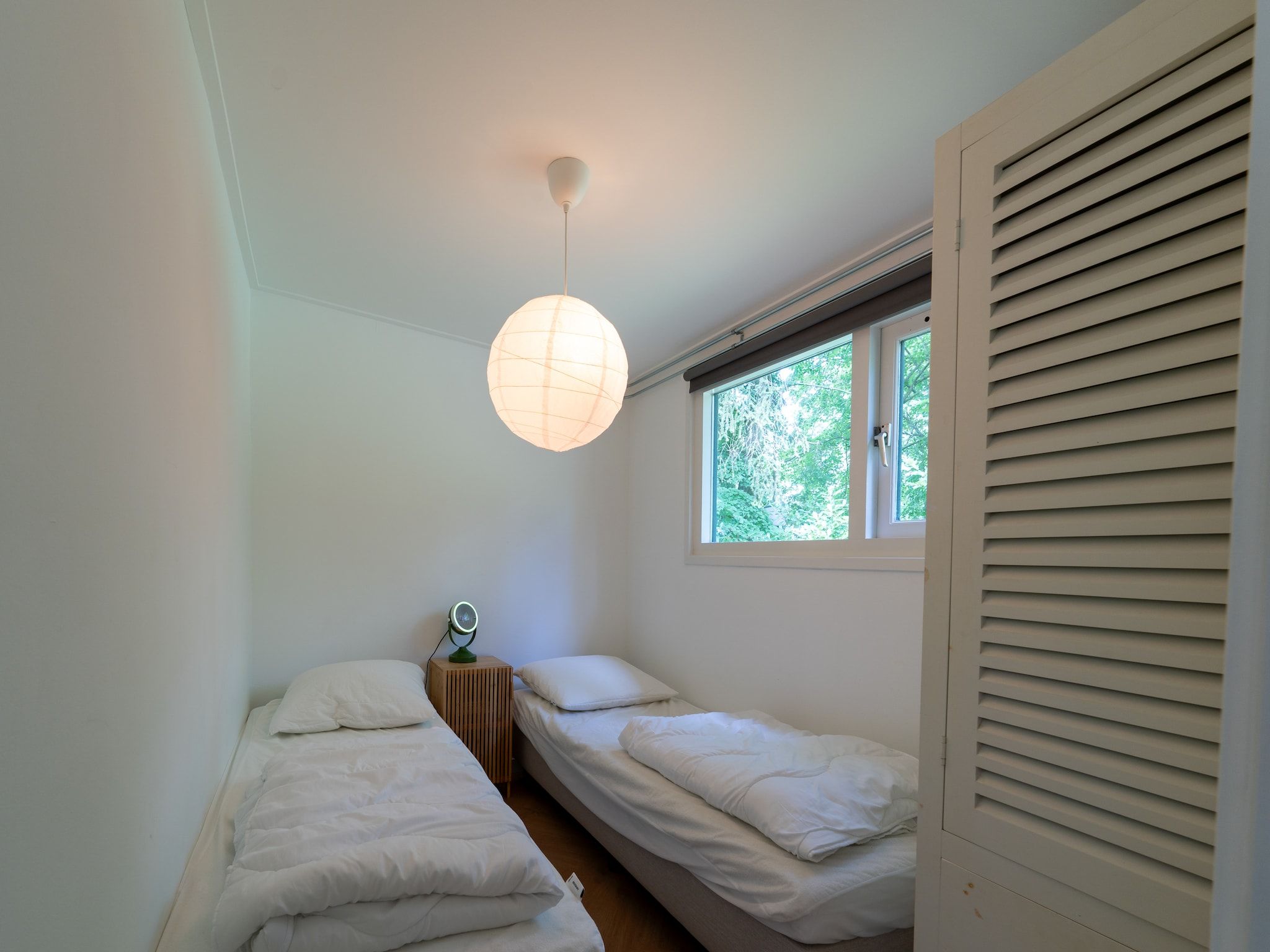 Een slaapkamer van Wellnes suite in Zelhem