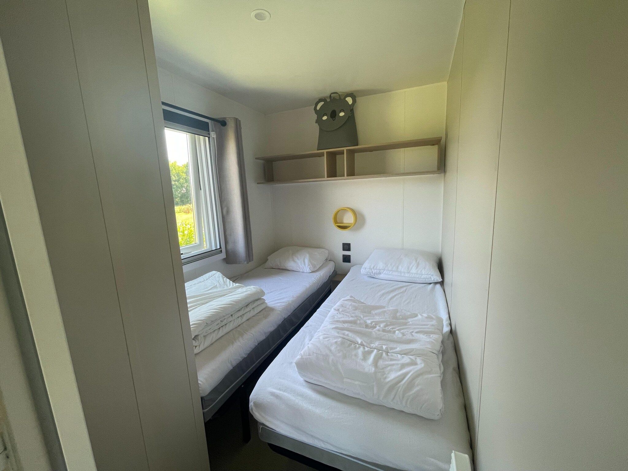 Een slaapkamer van Elperhof Leberenlodge in Schoonloo