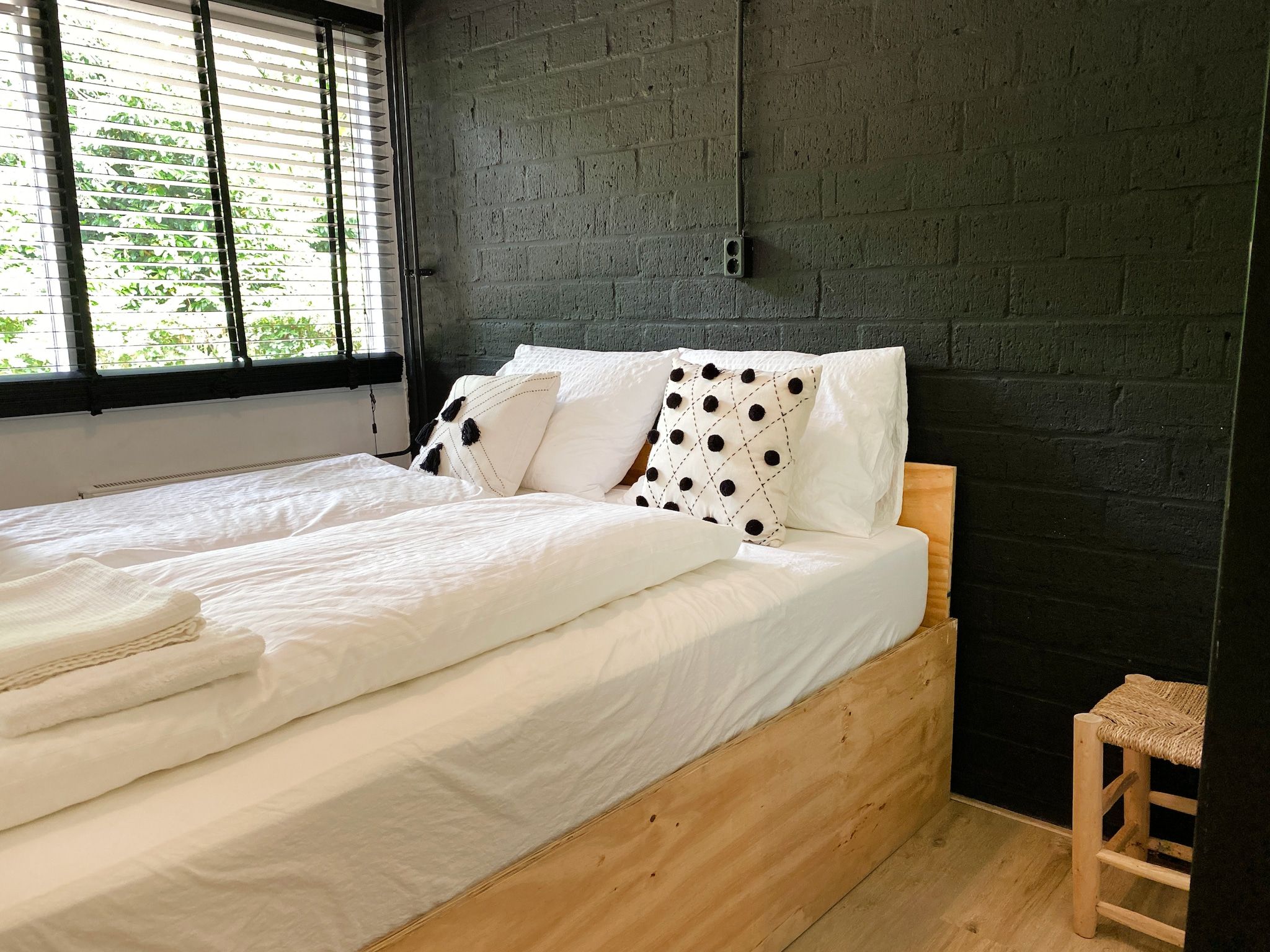 Een slaapkamer van Dutch Cabin Houses C65 in Rheezerveen