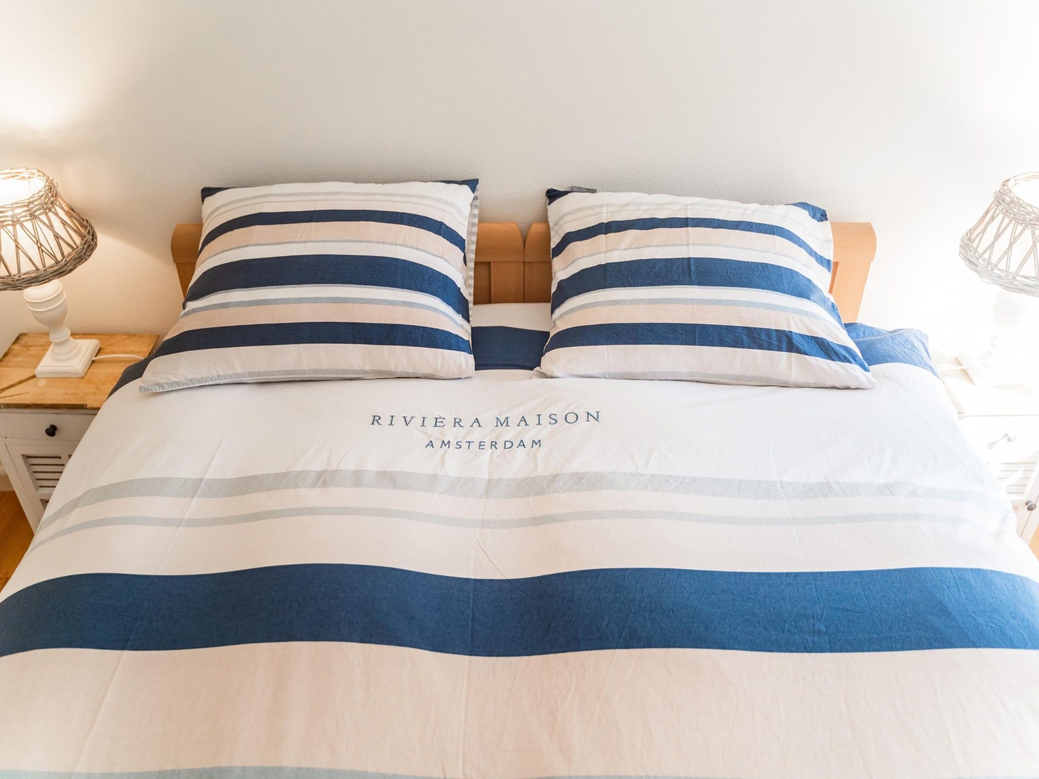 Een slaapkamer van Wad'n Leven en Geluk in Paesens