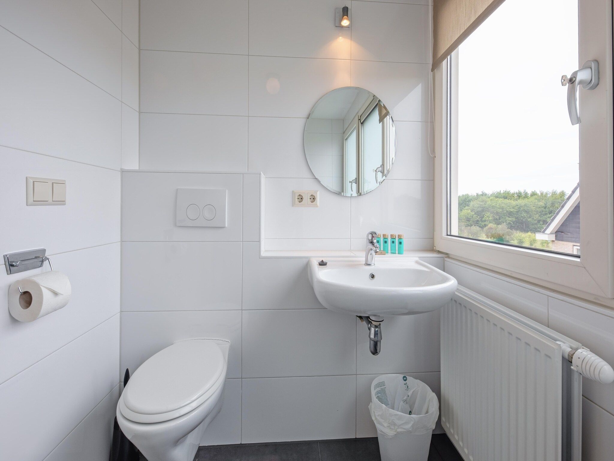 De badkamer van Wulpenweid 12 in Den Burg