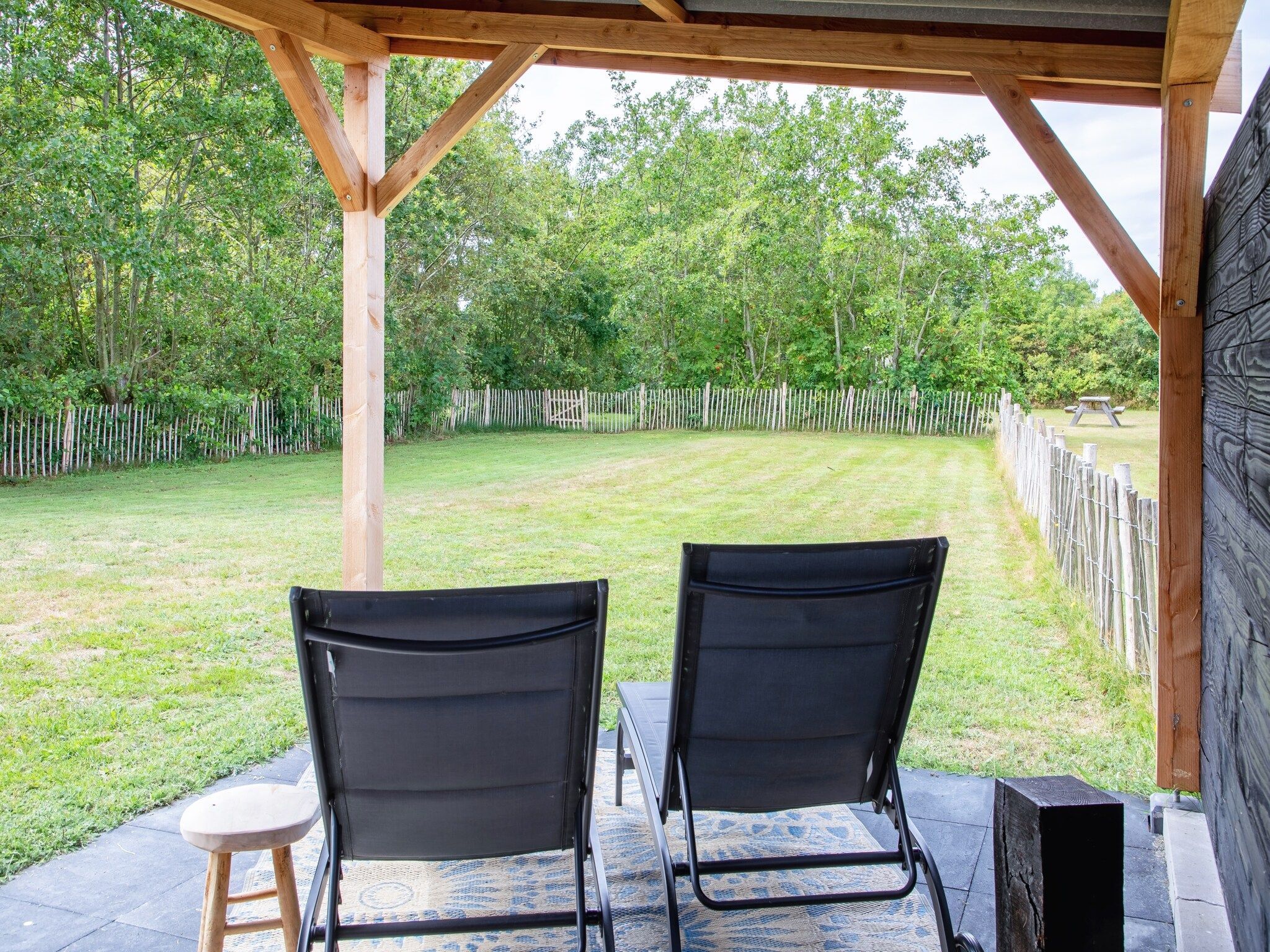 De tuin van Wulpenweid 12 in Den Burg