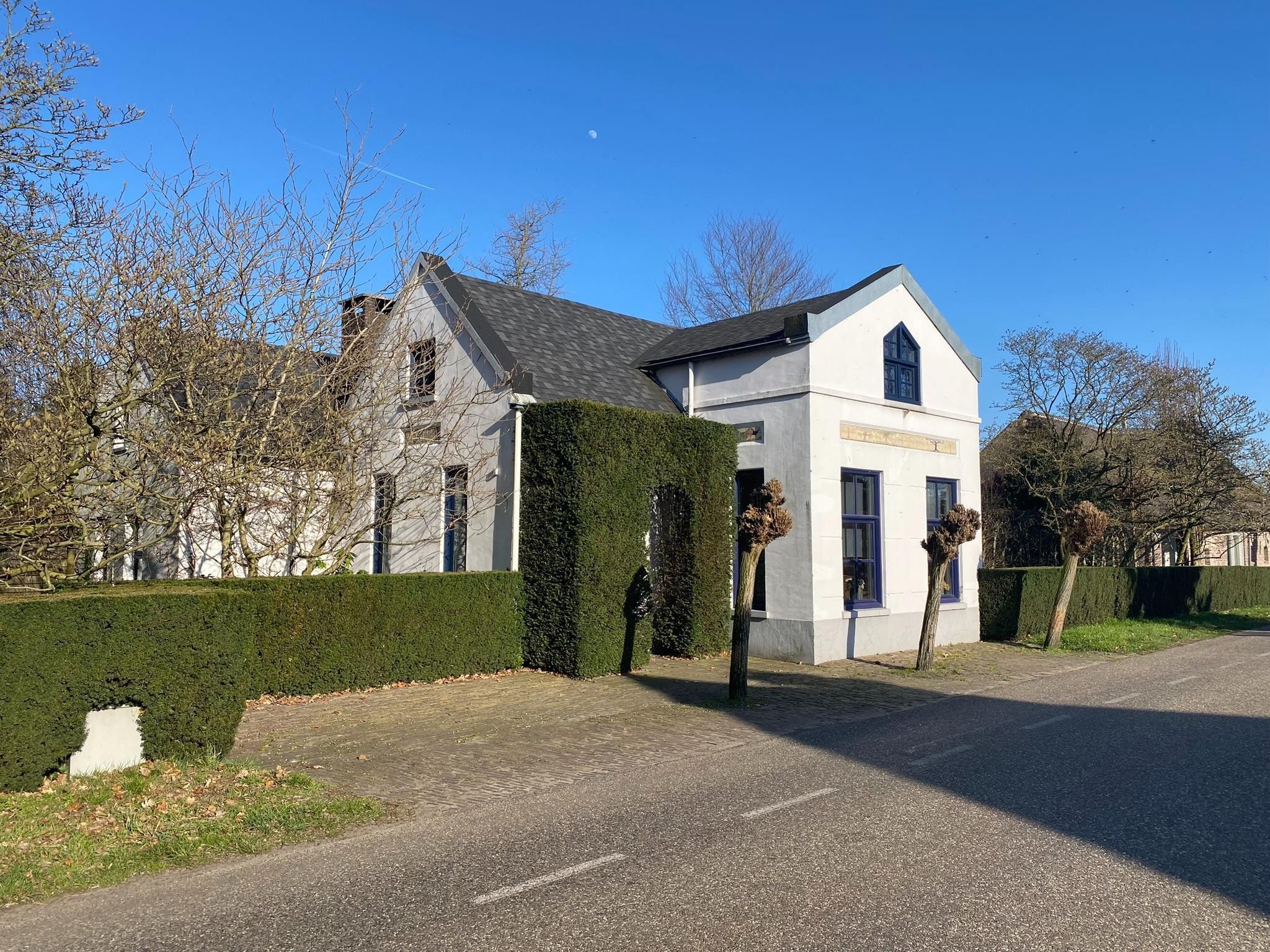 De buitenkant van Dorpswoning Het Tolhuis in Leende