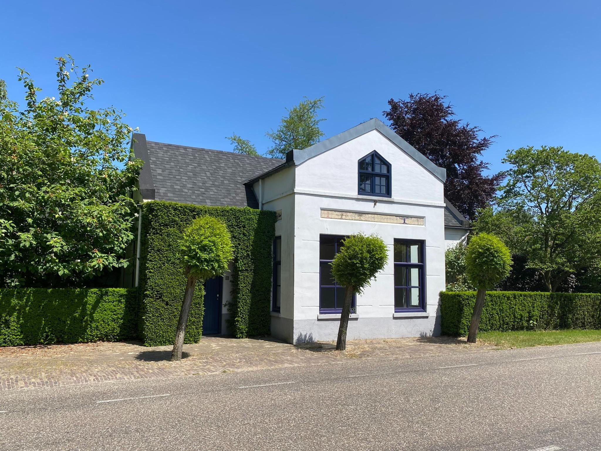 De buitenkant van Dorpswoning Het Tolhuis in Leende