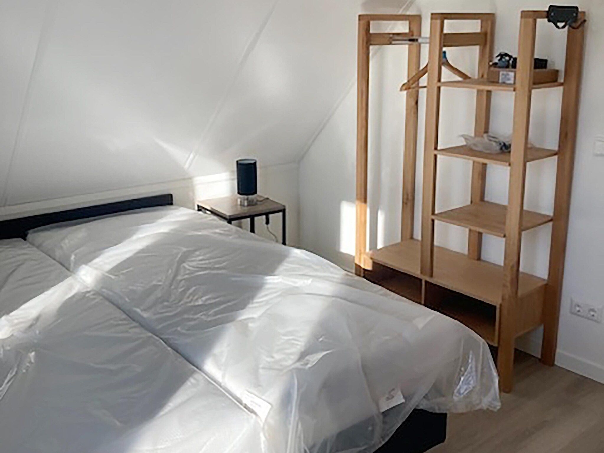 Een slaapkamer van Kuifduiker 124 in Simonshaven