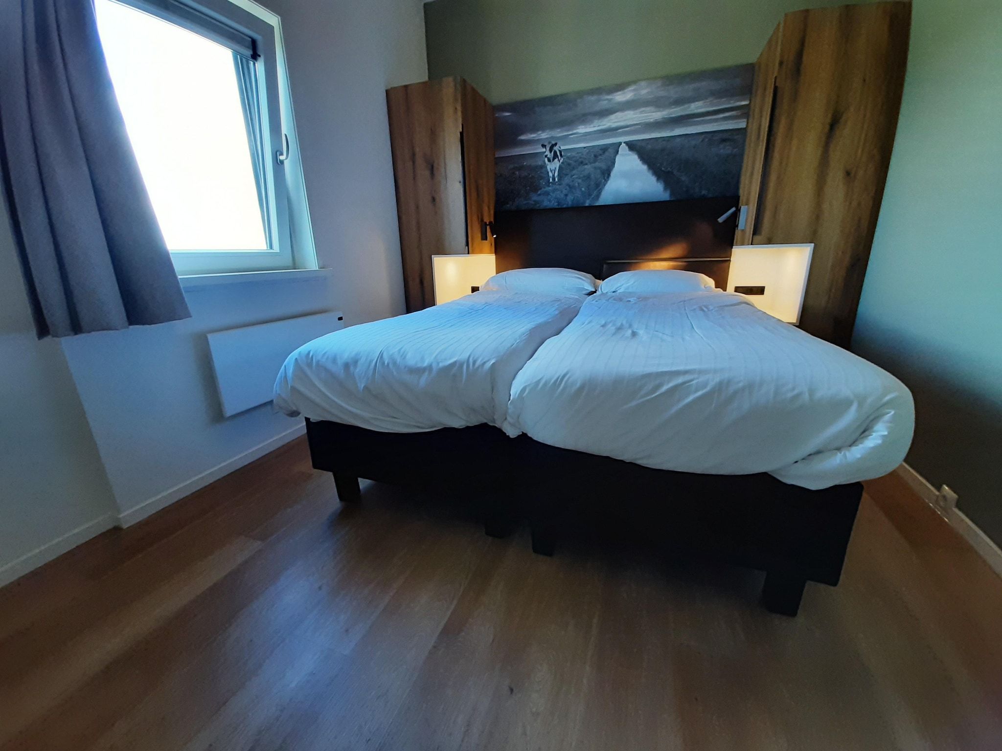 Een slaapkamer van 20 persoons villa in Leons