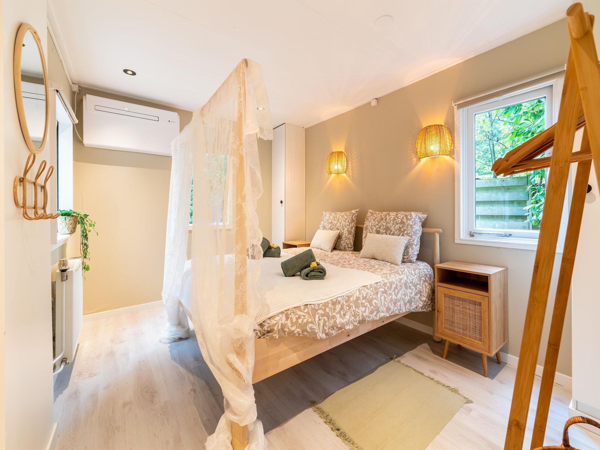 Een slaapkamer van Boshuisje Joy in Gelderland