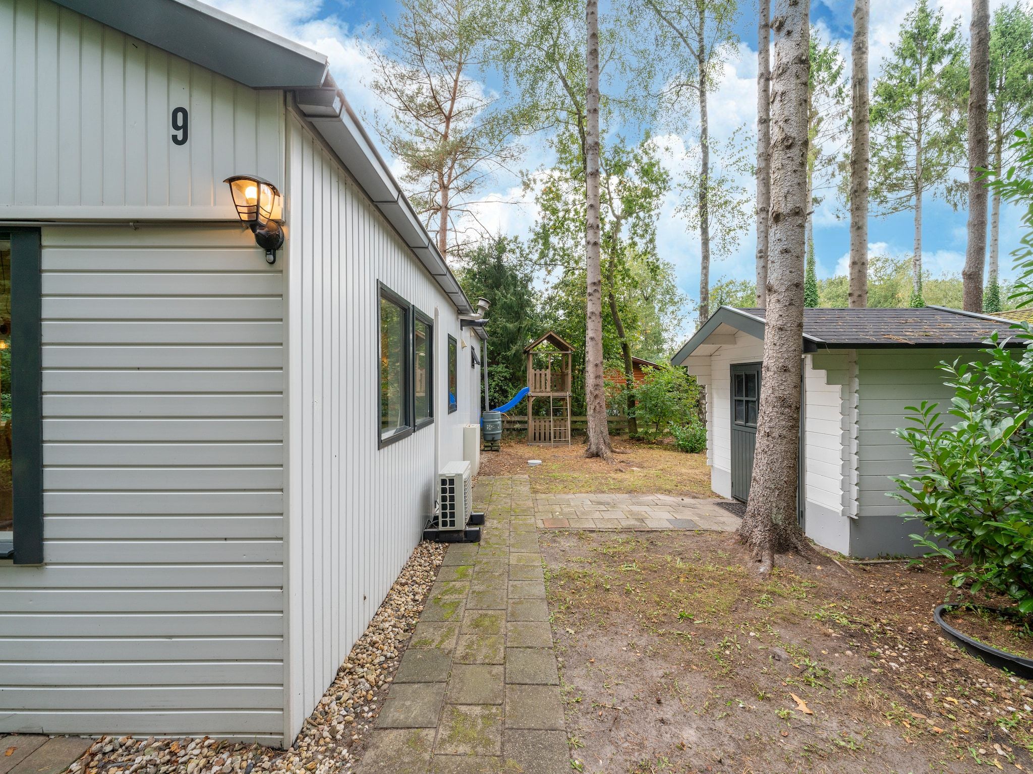 De tuin van Boshuisje Joy in Gelderland