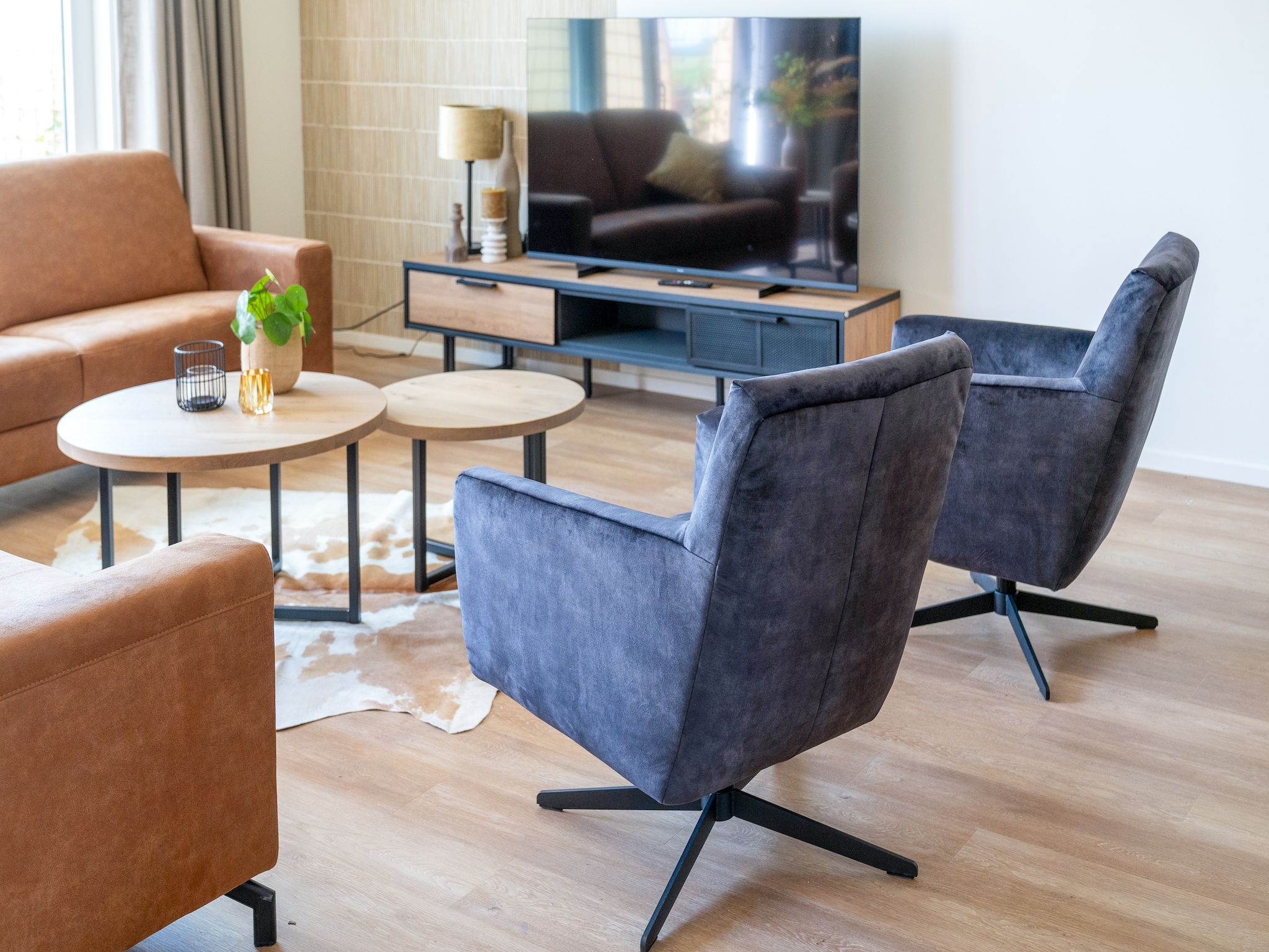 De woonkamer van 20 persoons villa in Leons