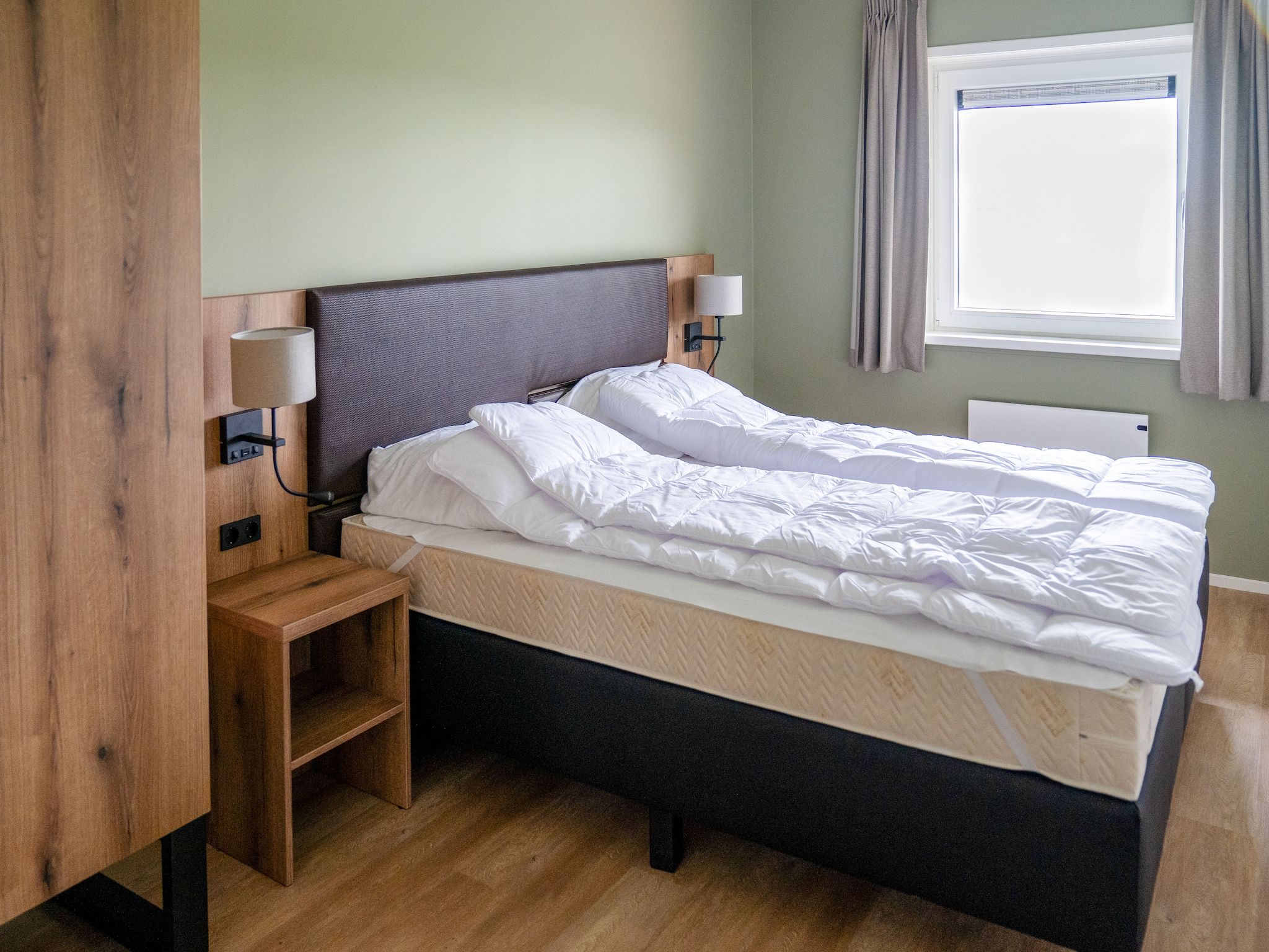 Een slaapkamer van 20 persoons villa in Leons