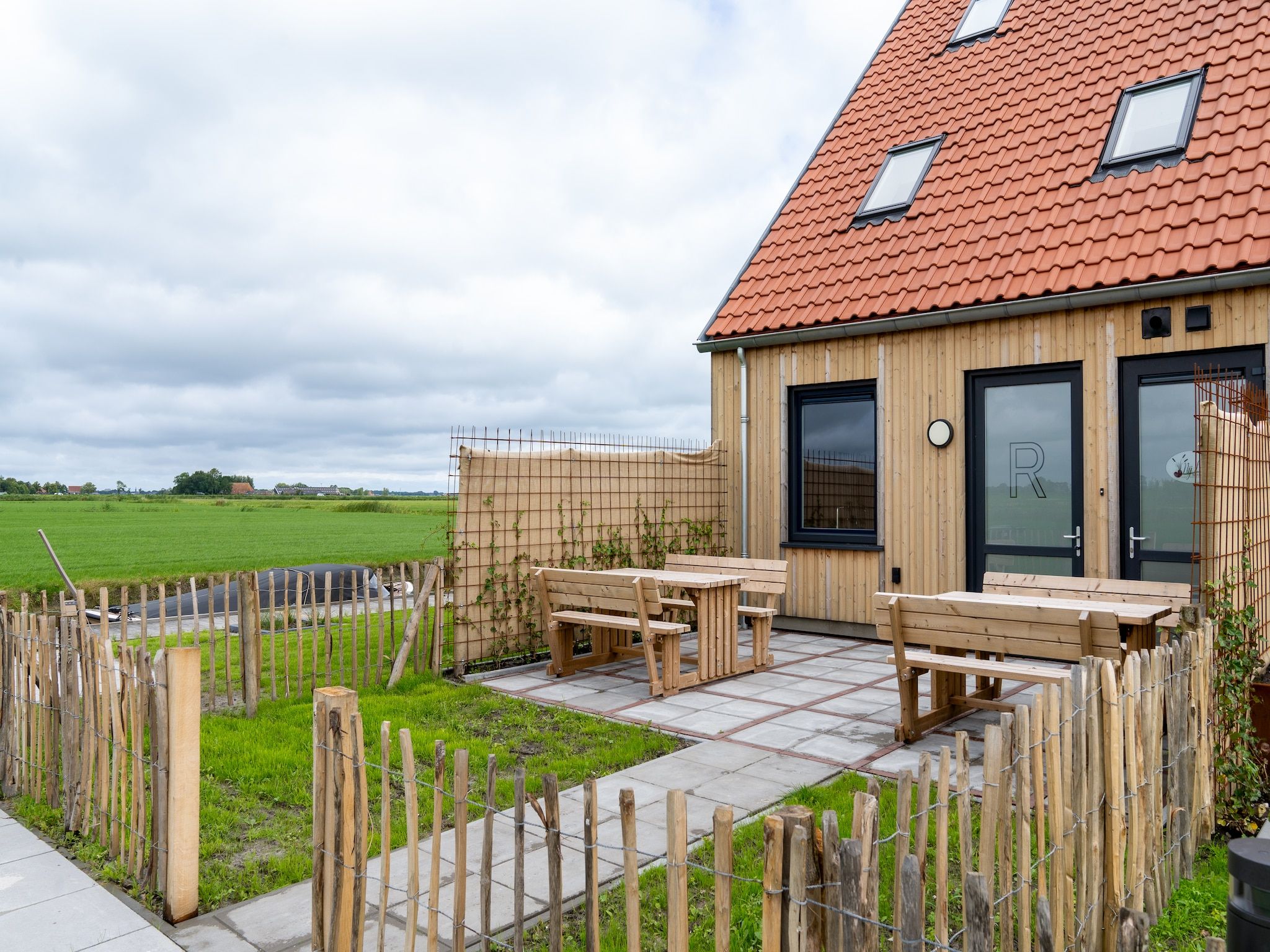De tuin van 20 persoons villa in Leons