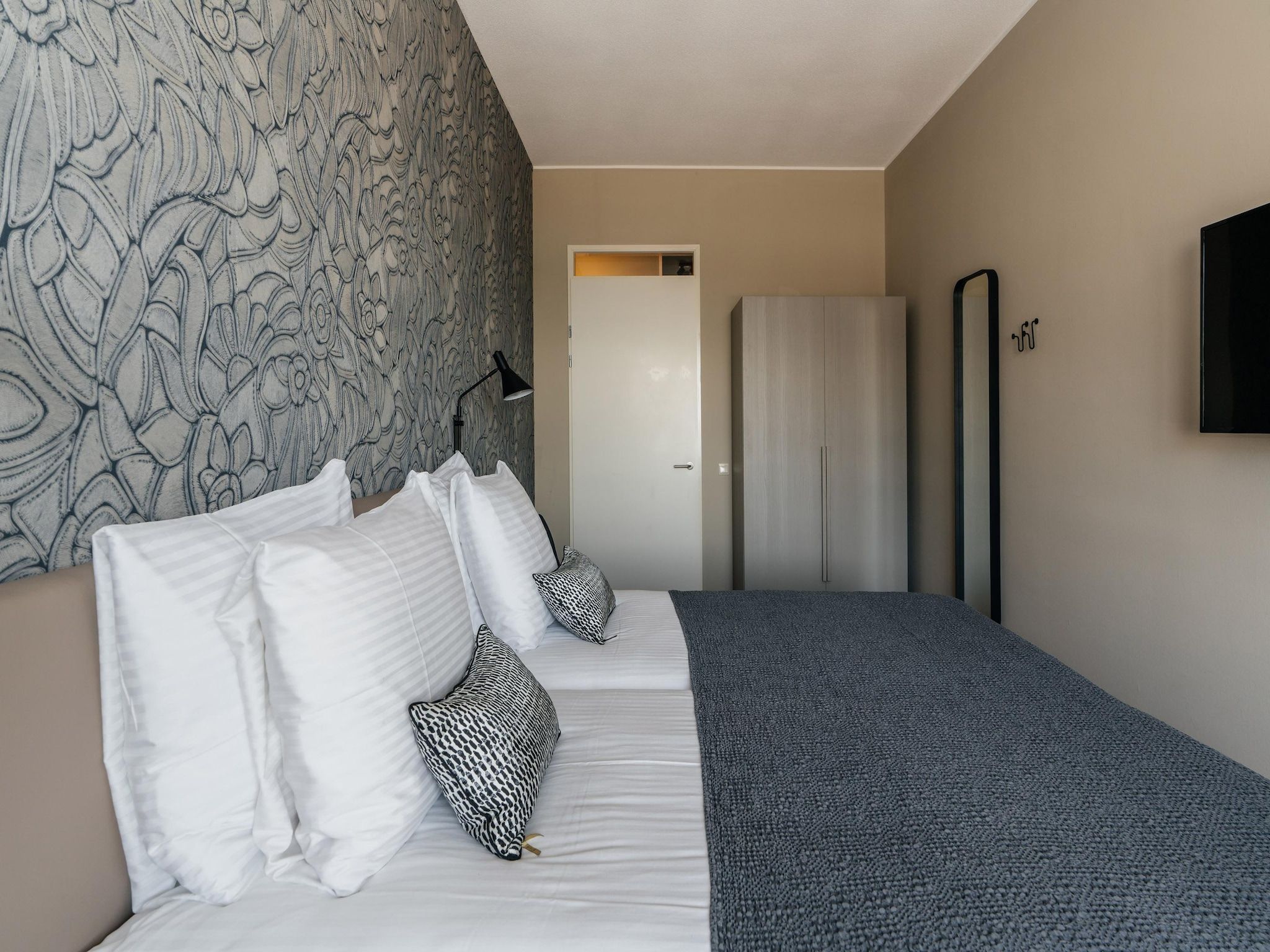 Een slaapkamer van Scheveningen Harbour 18C in Scheveningen