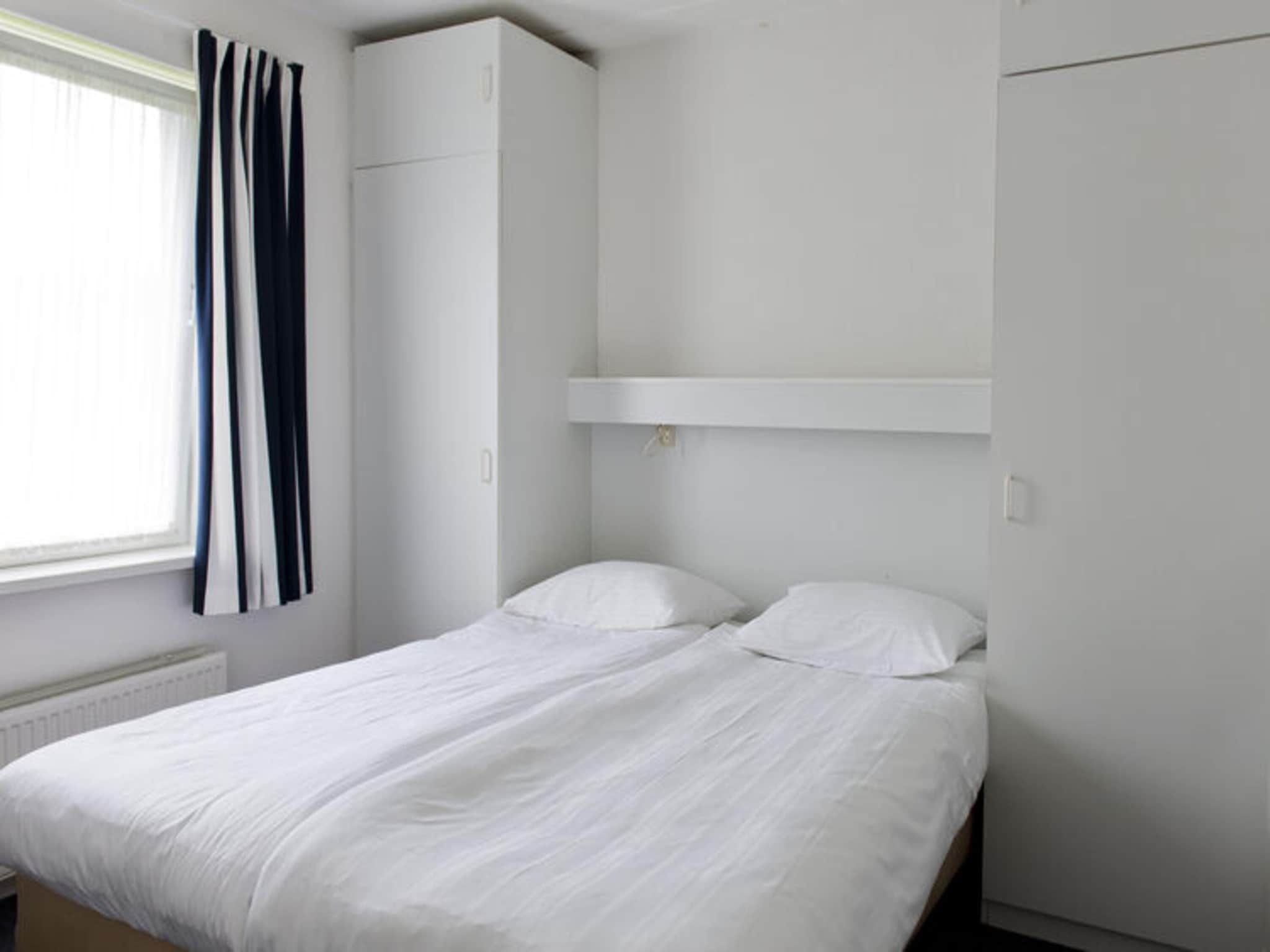 Een slaapkamer van Grand Tolve Wellness de luxe met sauna buitenspa in Earnewald