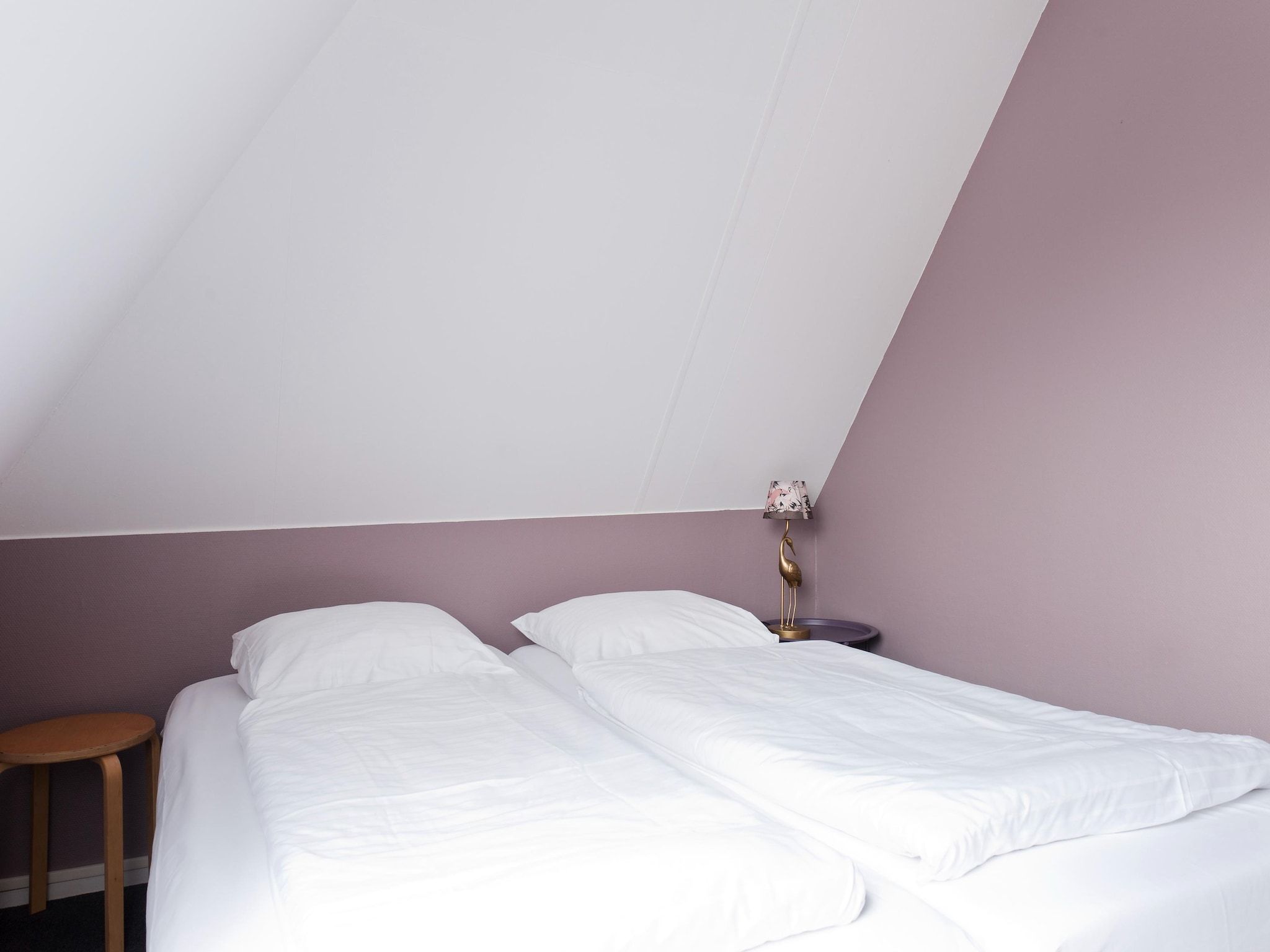 Een slaapkamer van Tobke Wellness de luxe VIP met sauna met buitenspa in Earnewald