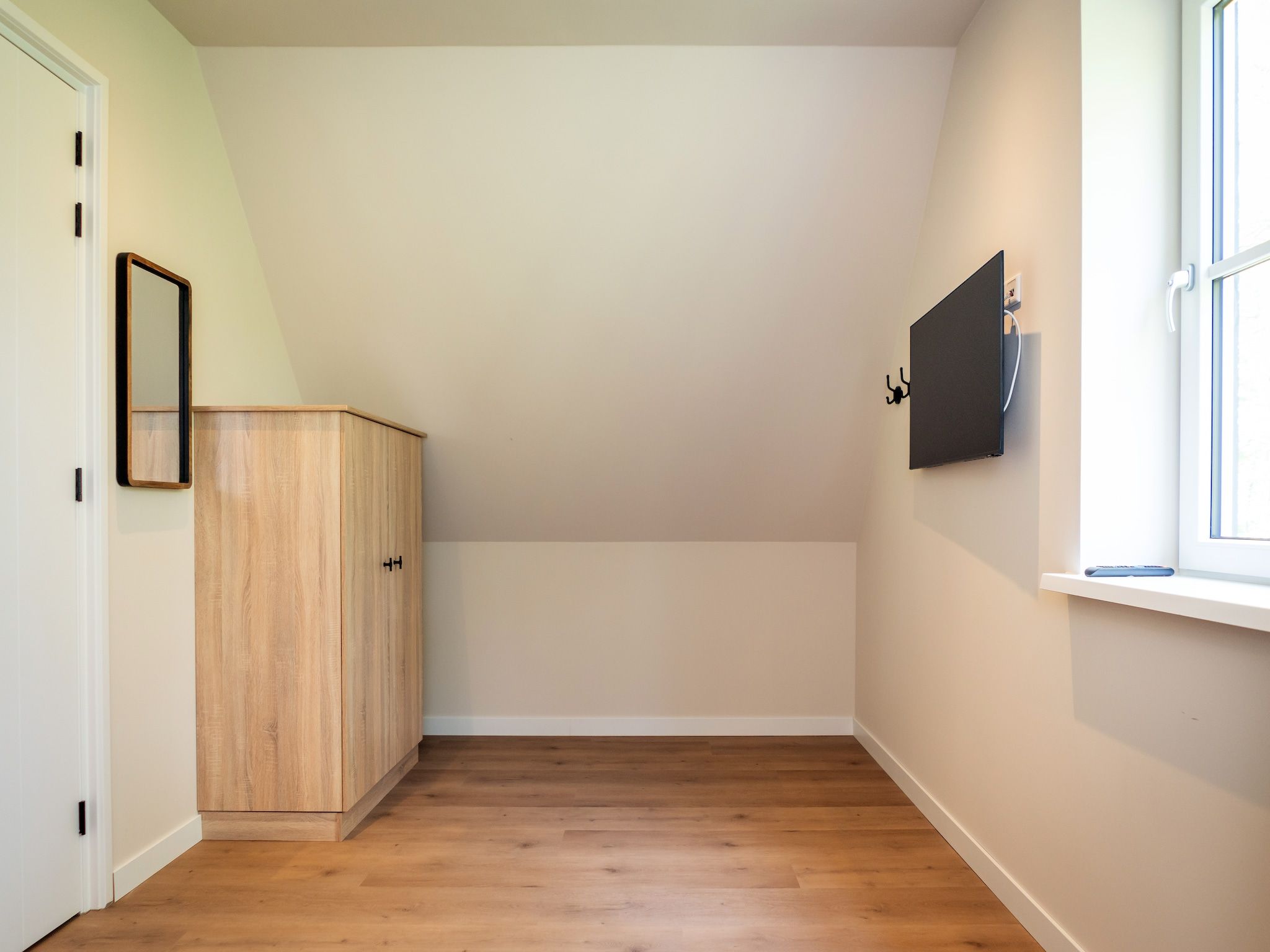 Een slaapkamer van So What 25a in De Koog