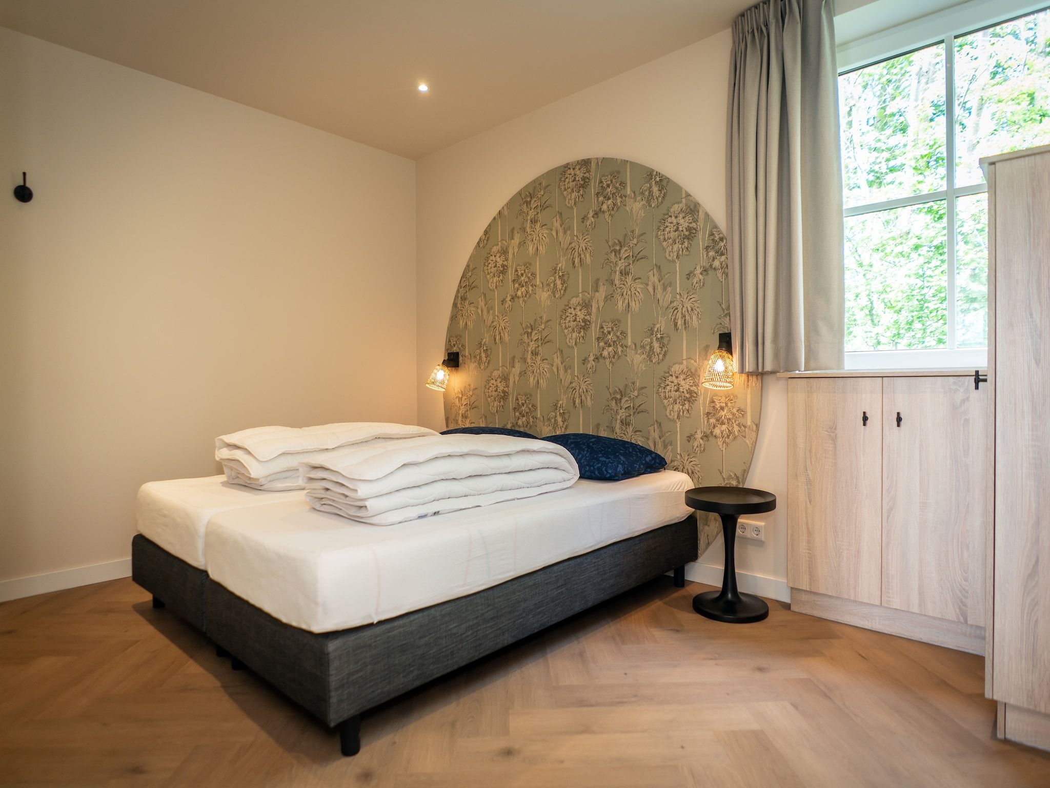 Een slaapkamer van So What 33A in De Koog