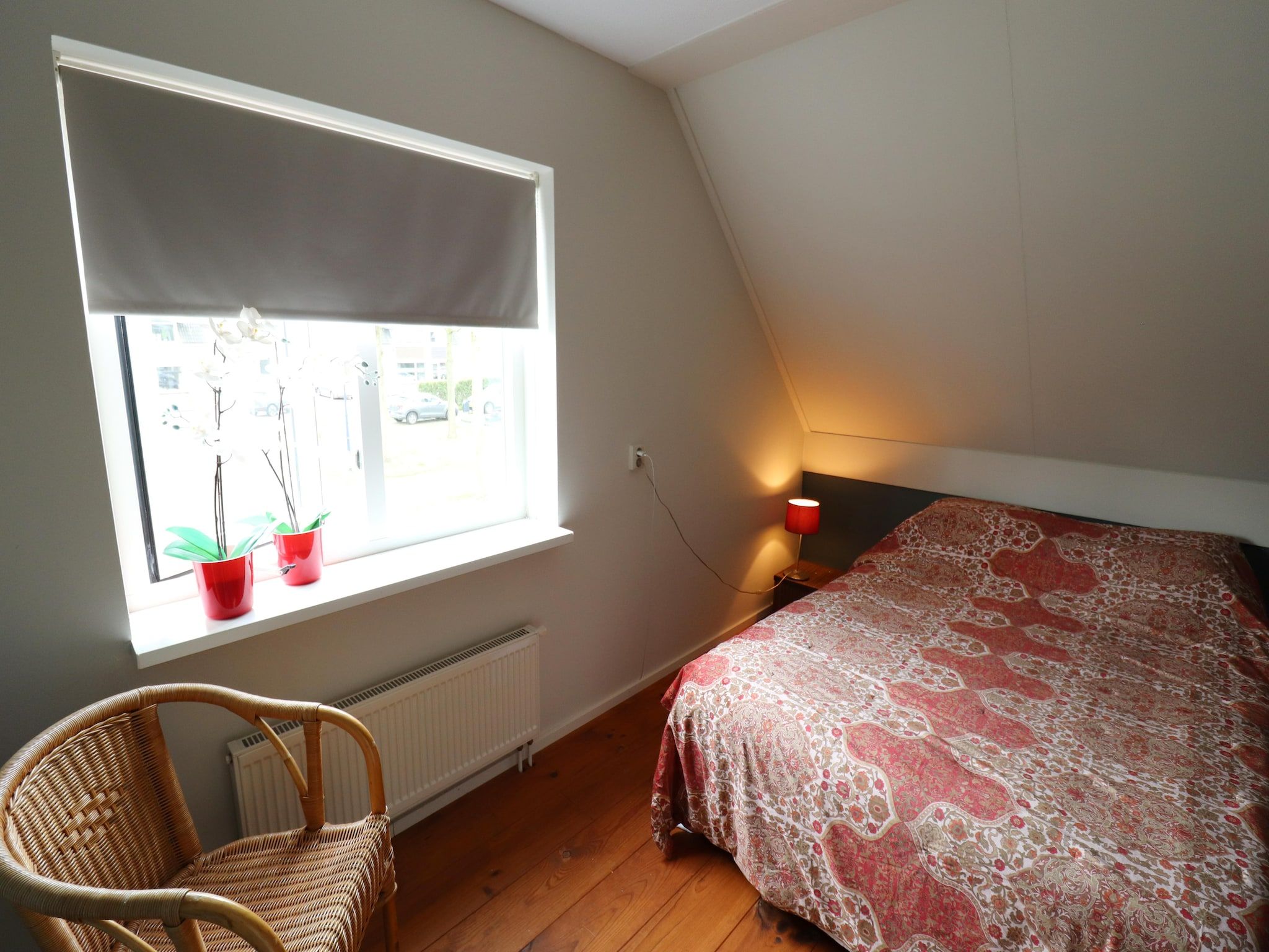 Een slaapkamer van Vakantiehuis in zonnig Grou in Gou
