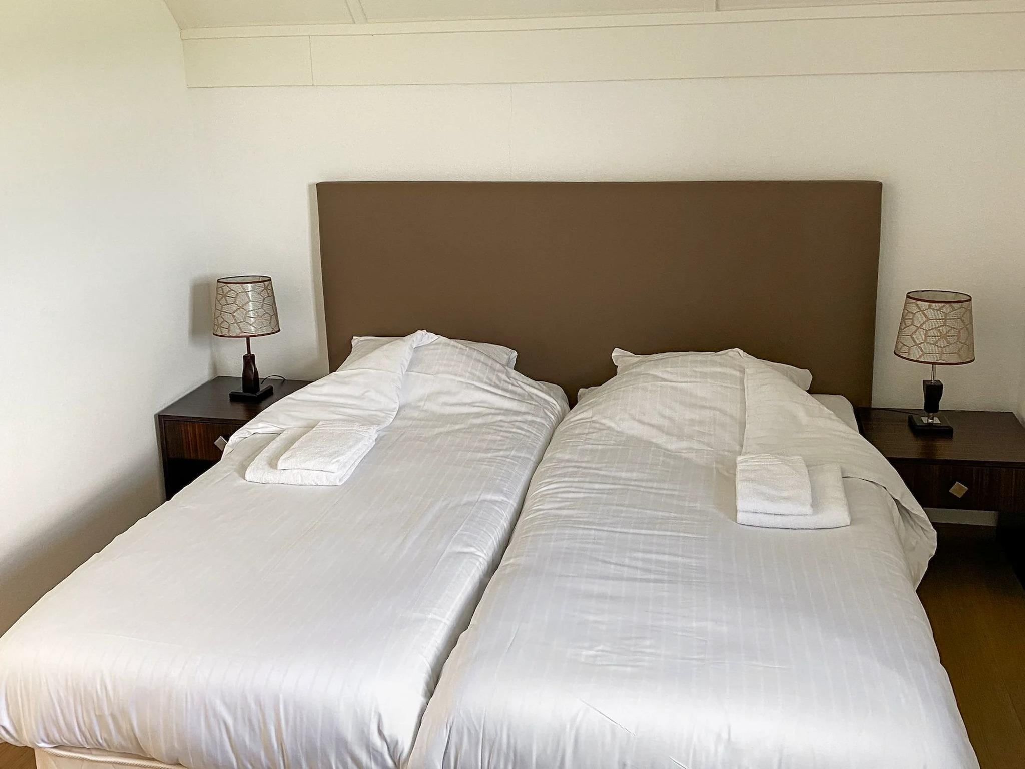 Een slaapkamer van Villaparc Schoonhovenseland 2 in Hollandscheveld