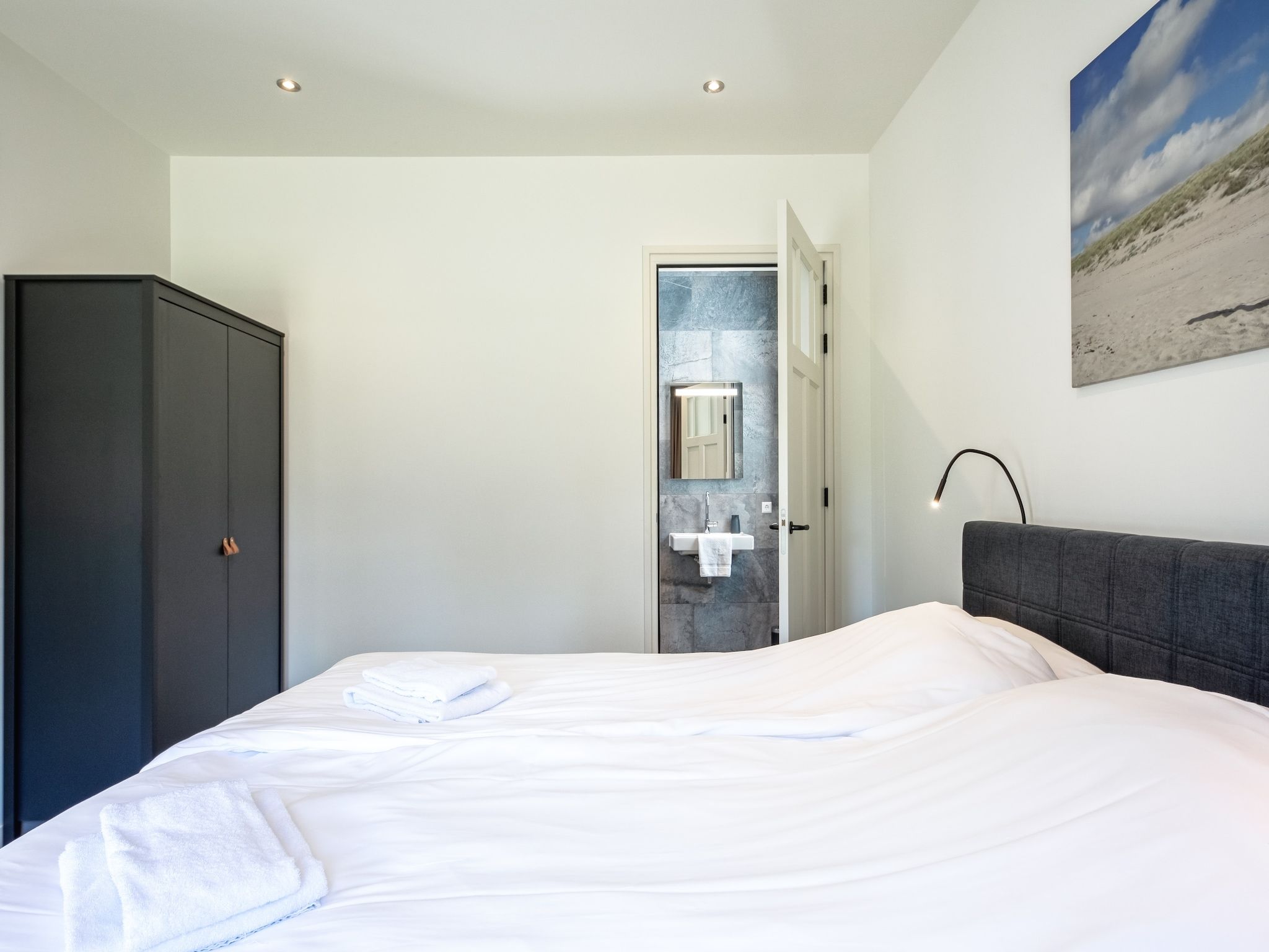 Een slaapkamer van Familievilla Nieuw-Zeeland in Oosterend